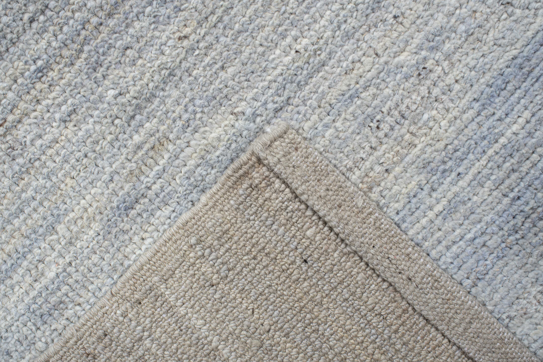9' x 12' one-of-a-kind handmade vintage Tulu large size rug. Color palette: pale blue, ivory, silver, slate, light blue