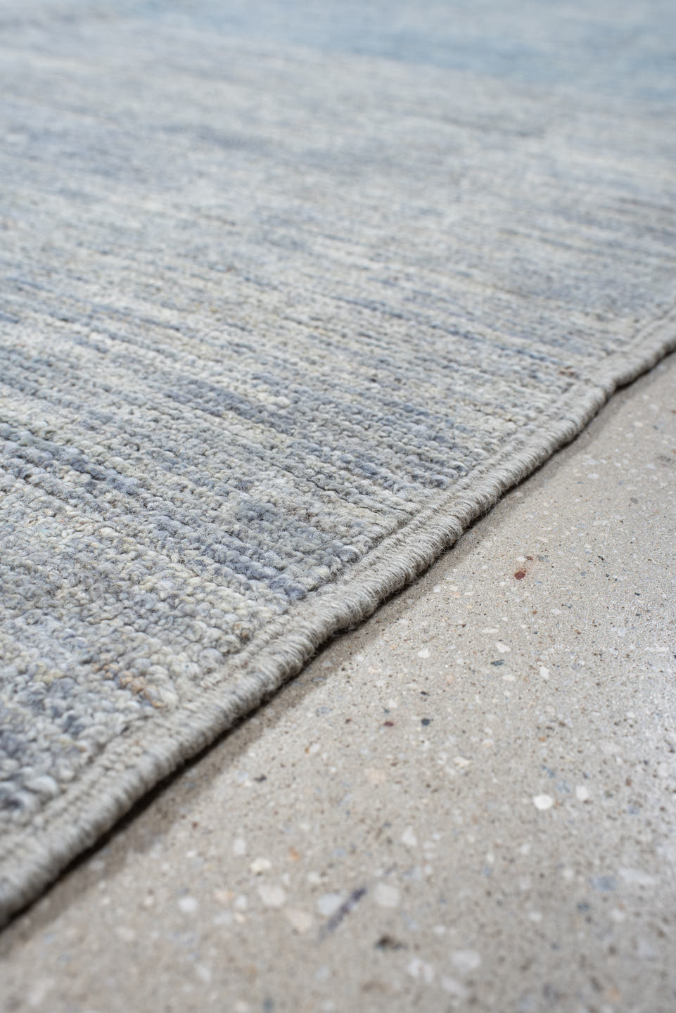 9' x 12' one-of-a-kind handmade vintage Tulu large size rug. Color palette: pale blue, ivory, silver, slate, light blue