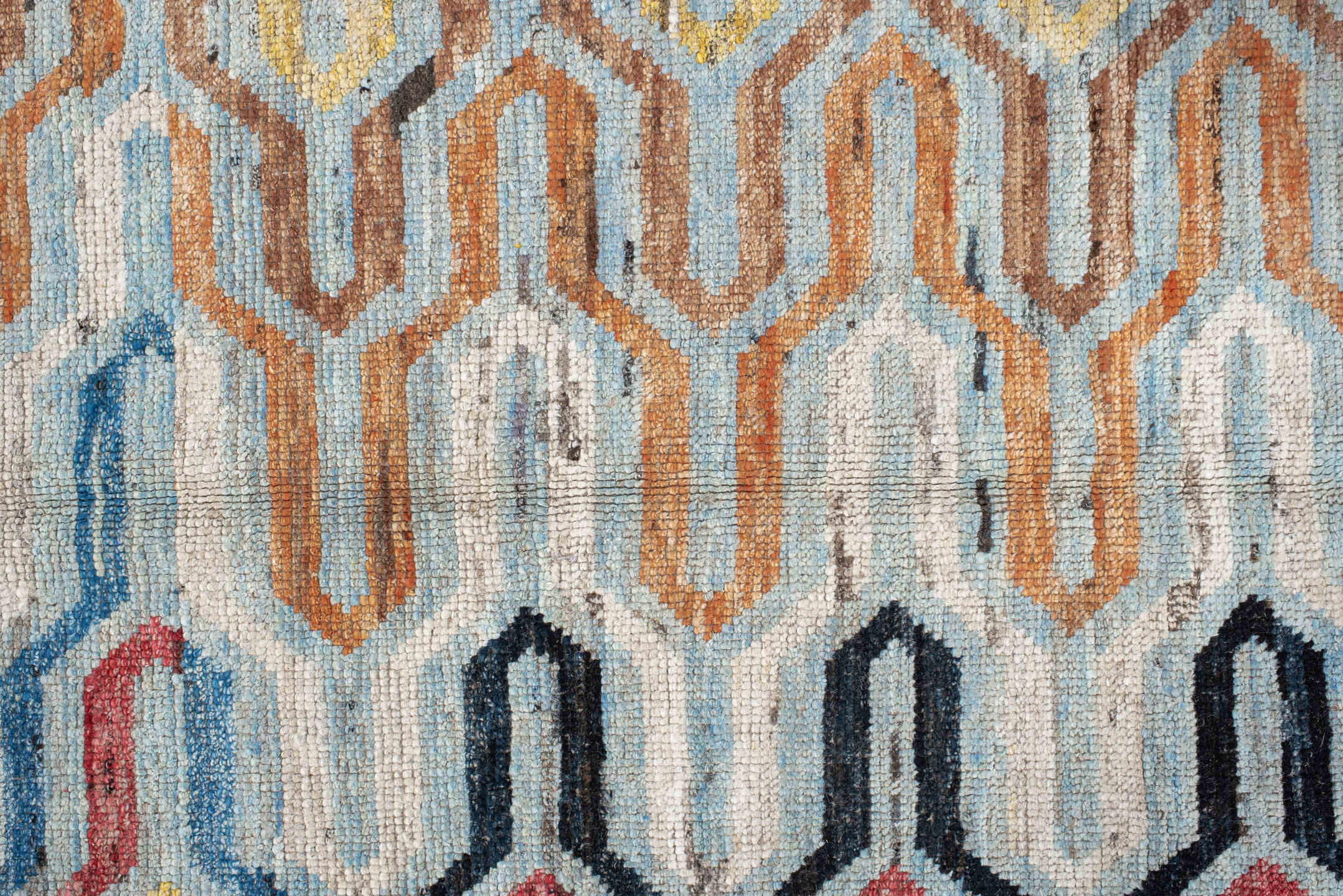 6' x 9' one-of-a-kind handmade vintage Tulu medium size rug. Color palette: red, pink, gray, orange, brown, yellow