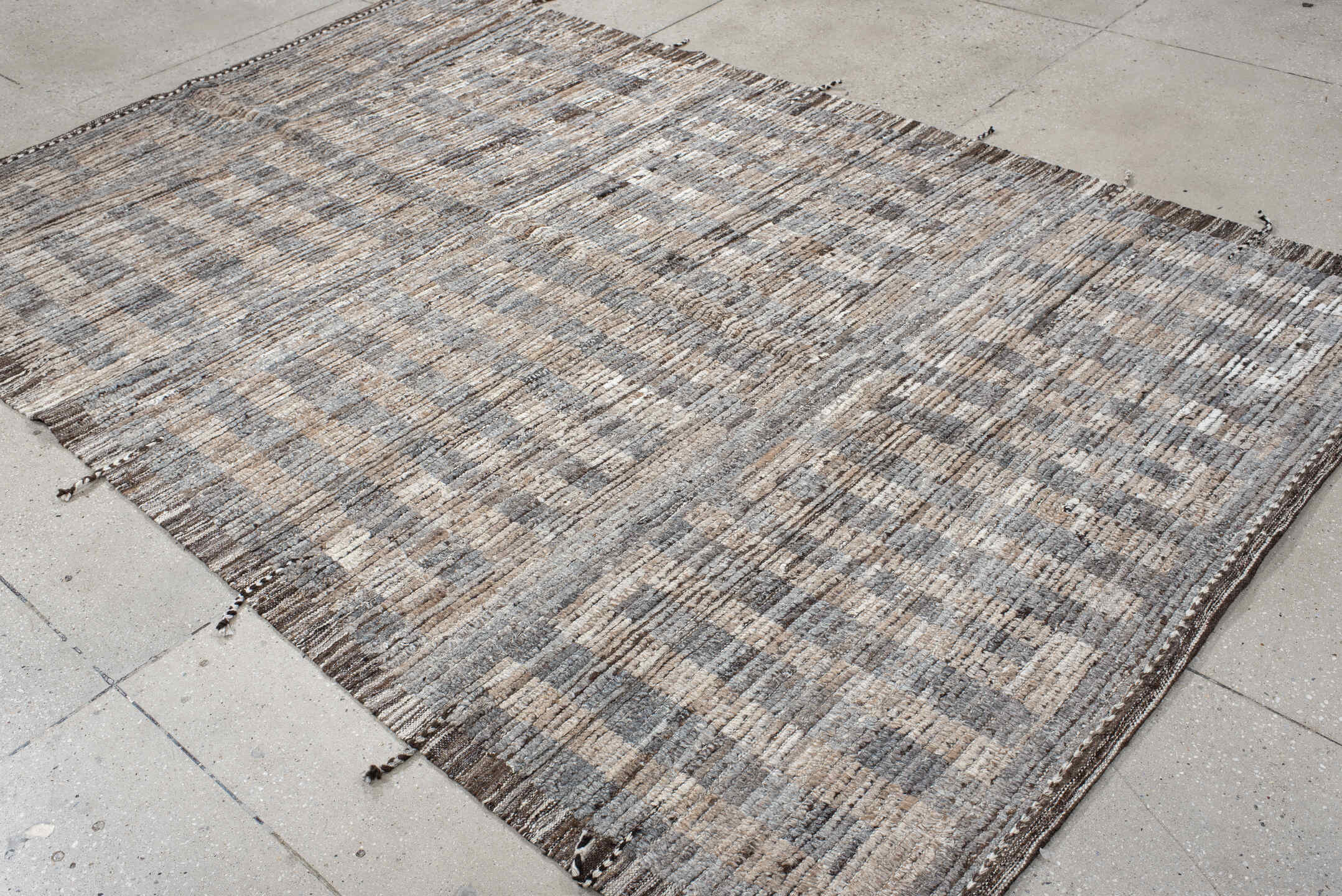 6' x 9' one-of-a-kind handmade vintage Tulu medium size rug. Color palette: ivory, gray, brown, taupe, charcoal, beige