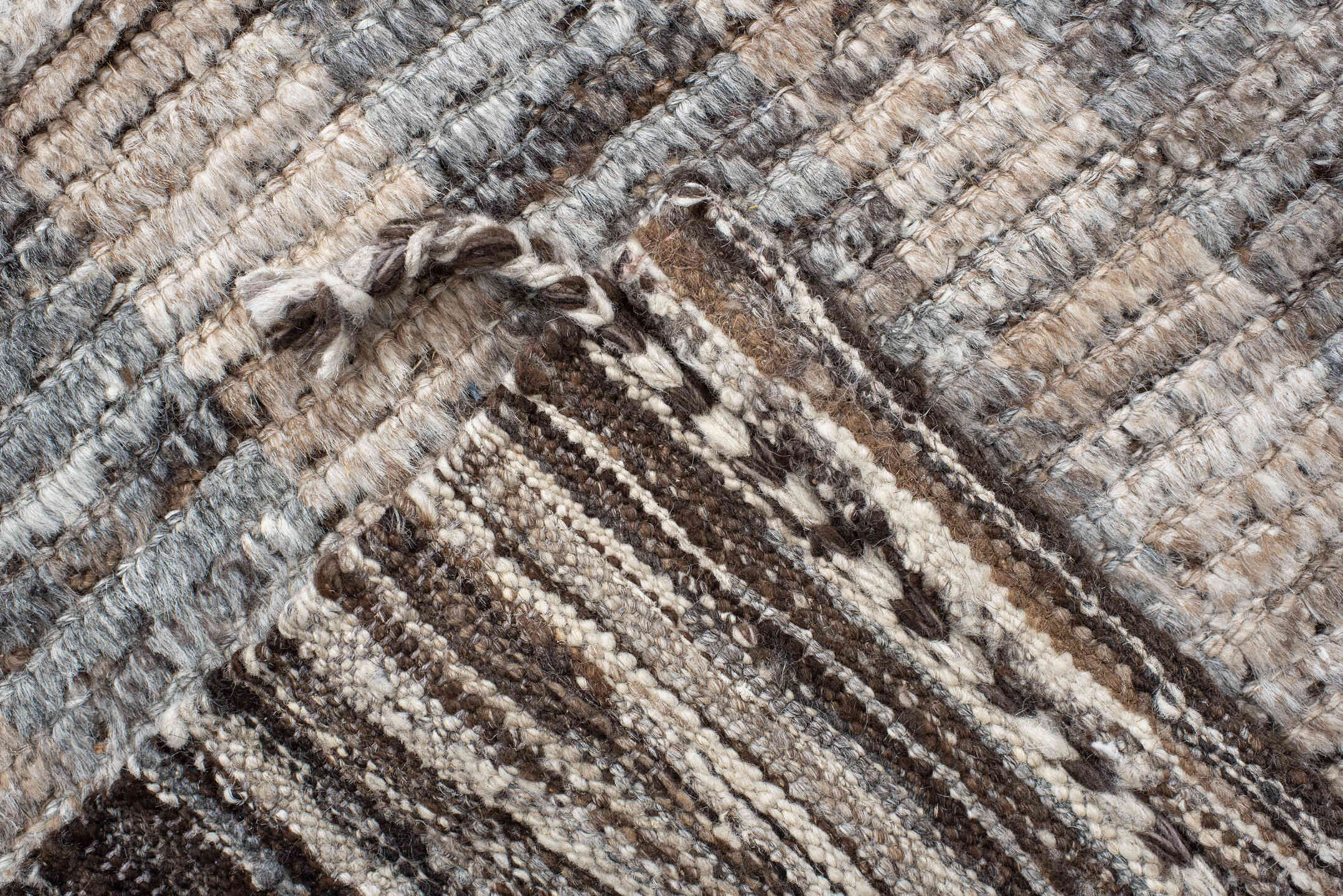 6' x 9' one-of-a-kind handmade vintage Tulu medium size rug. Color palette: ivory, gray, brown, taupe, charcoal, beige