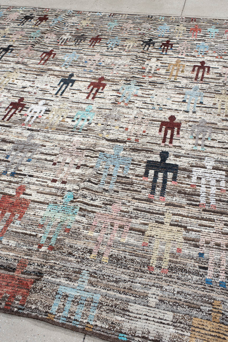 8' x 9' one-of-a-kind handmade vintage Tulu rug. Color palette: ivory, brown, taupe, rust, pale_blue, charcoal, burgundy