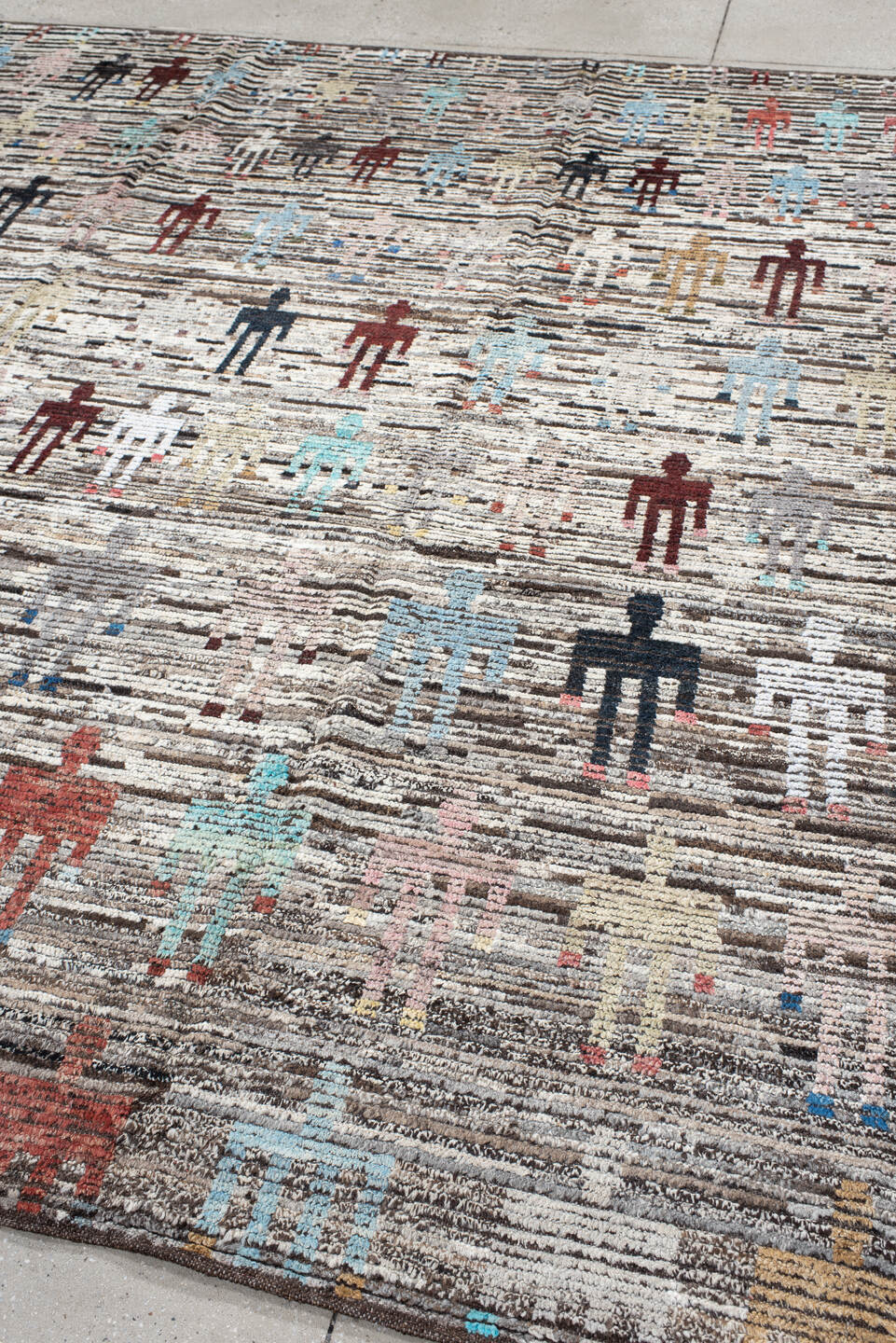 8' x 9' one-of-a-kind handmade vintage Tulu rug. Color palette: ivory, brown, taupe, rust, pale_blue, charcoal, burgundy