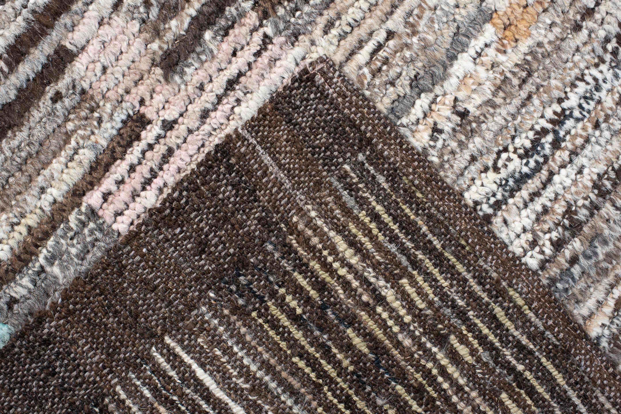 8' x 9' one-of-a-kind handmade vintage Tulu rug. Color palette: ivory, brown, taupe, rust, pale_blue, charcoal, burgundy