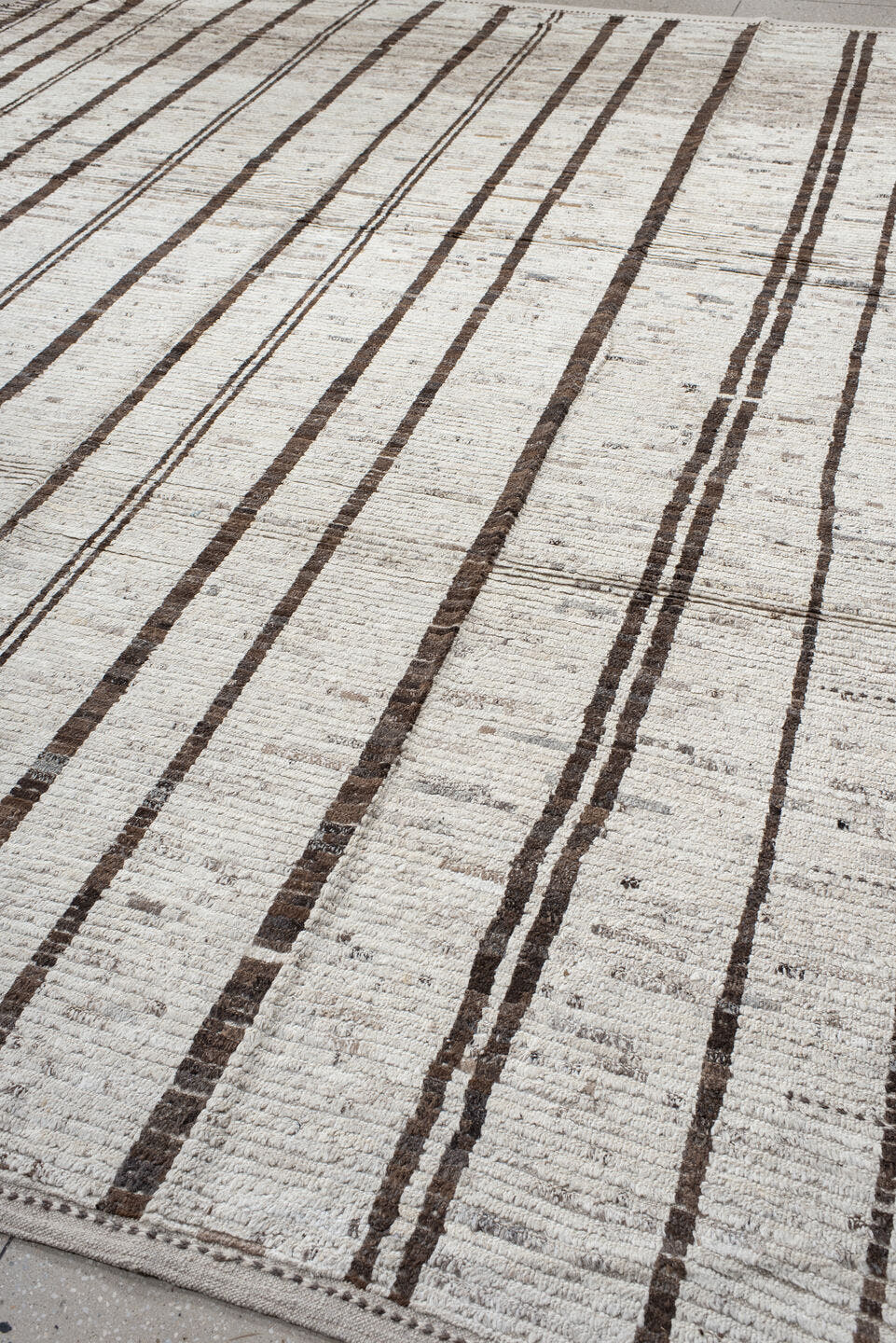11' x 13' one-of-a-kind handmade vintage Tulu oversize rug. Color palette: ivory, brown, taupe, charcoal, beige, gray, black