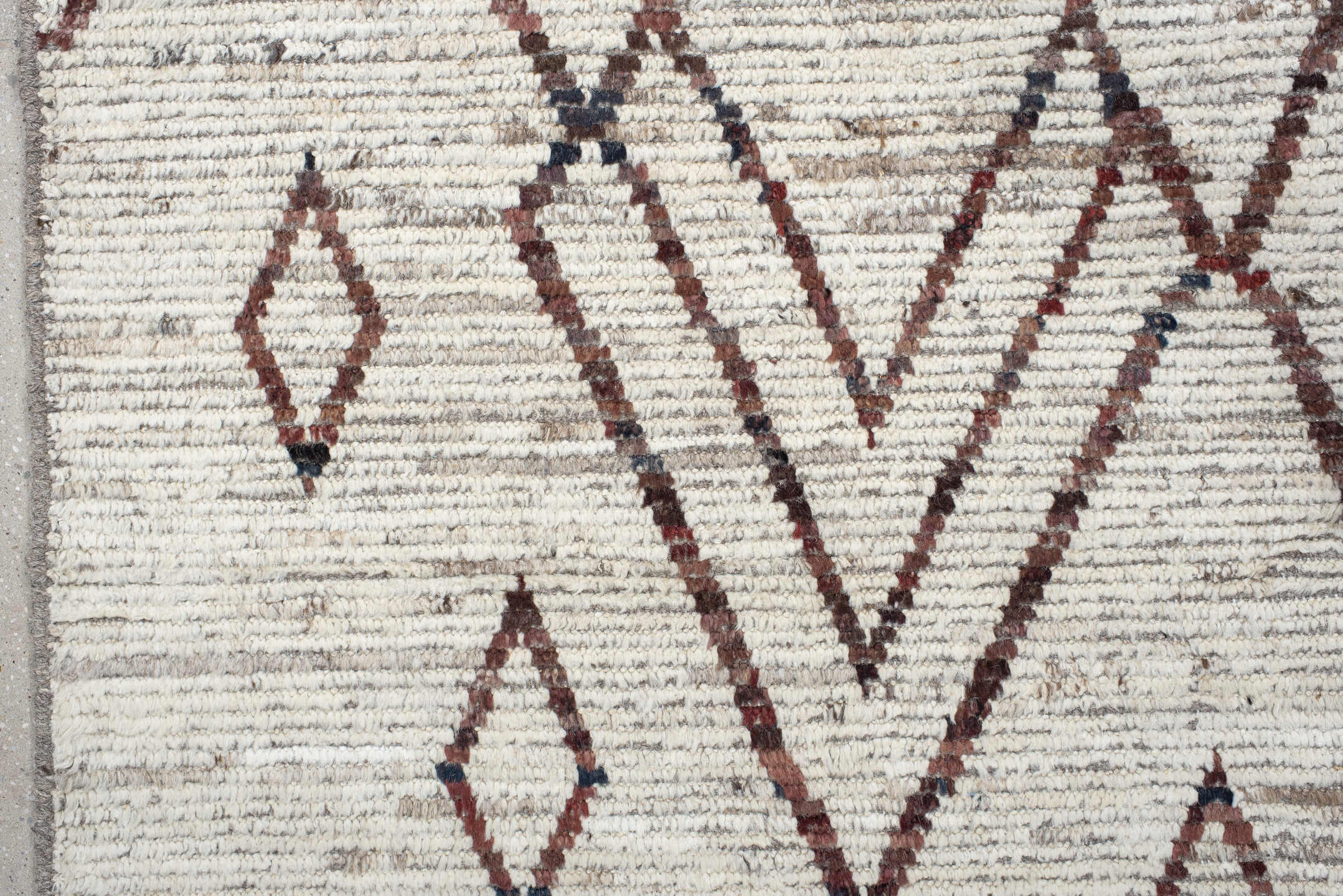 8' x 9' one-of-a-kind handmade vintage Tulu rug. Color palette: ivory, brown, taupe, charcoal, rose, beige, gray, black