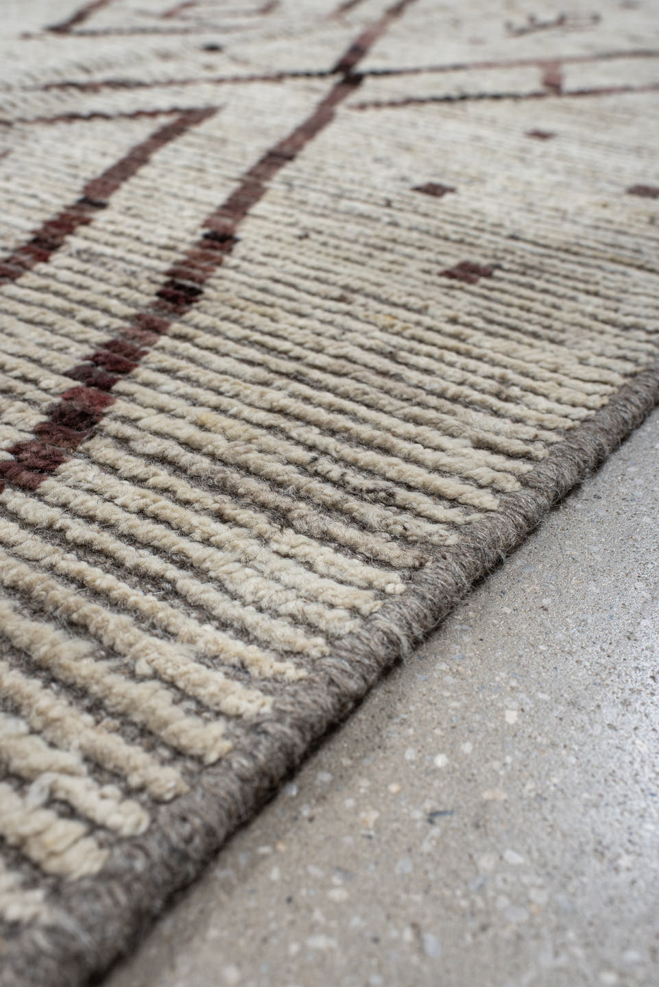 8' x 9' one-of-a-kind handmade vintage Tulu rug. Color palette: ivory, brown, taupe, charcoal, rose, beige, gray, black