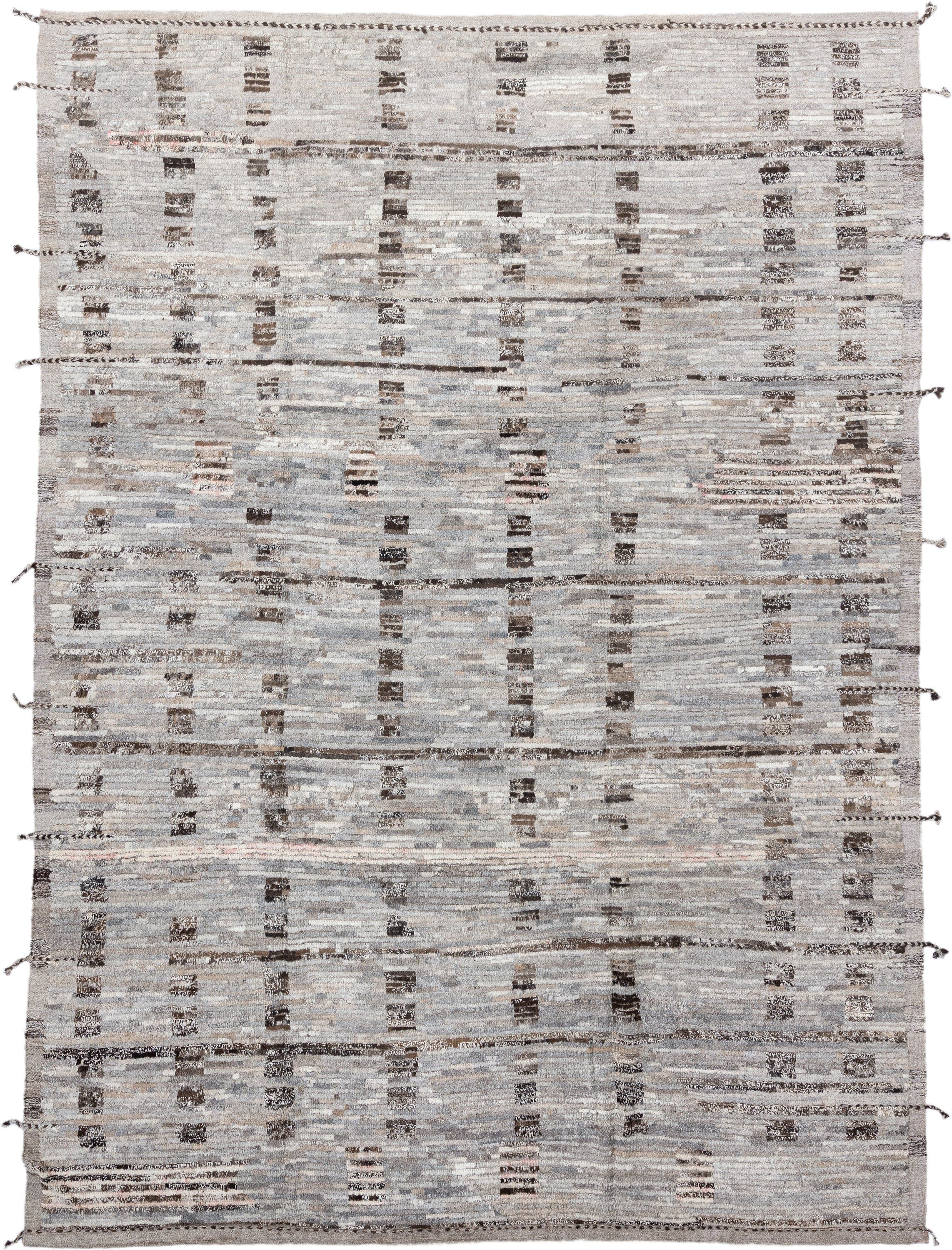 8' x 12' one-of-a-kind handmade vintage Tulu large size rug. Color palette: ivory, taupe, gray, charcoal, brown, cream, rose
