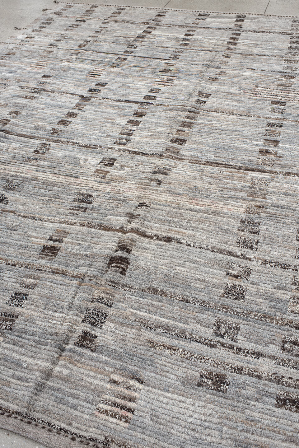 8' x 12' one-of-a-kind handmade vintage Tulu large size rug. Color palette: ivory, taupe, gray, charcoal, brown, cream, rose