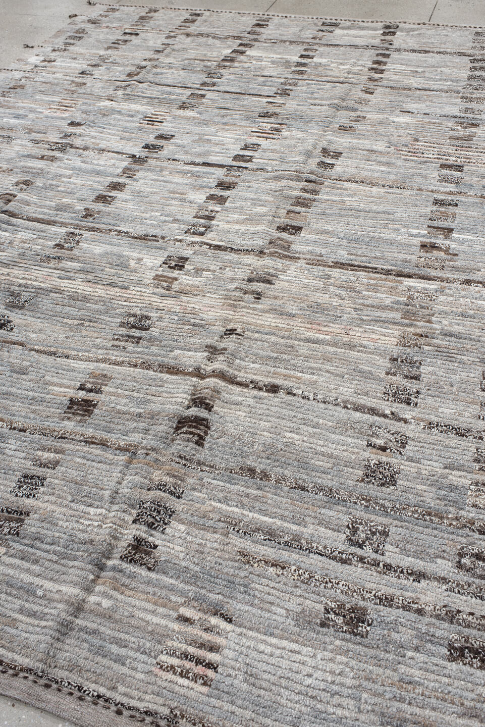 8' x 12' one-of-a-kind handmade vintage Tulu large size rug. Color palette: ivory, taupe, gray, charcoal, brown, cream, rose
