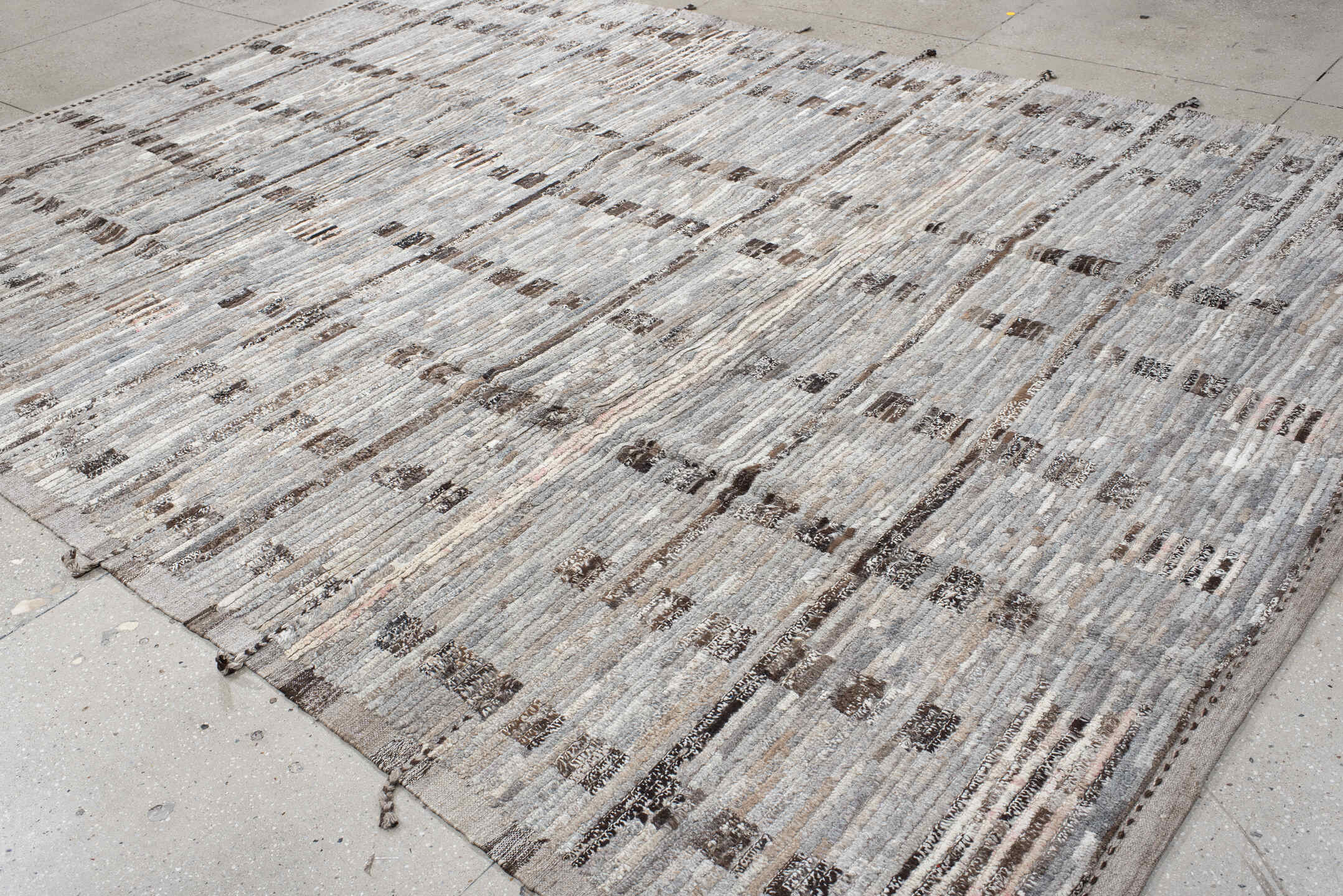8' x 12' one-of-a-kind handmade vintage Tulu large size rug. Color palette: ivory, taupe, gray, charcoal, brown, cream, rose