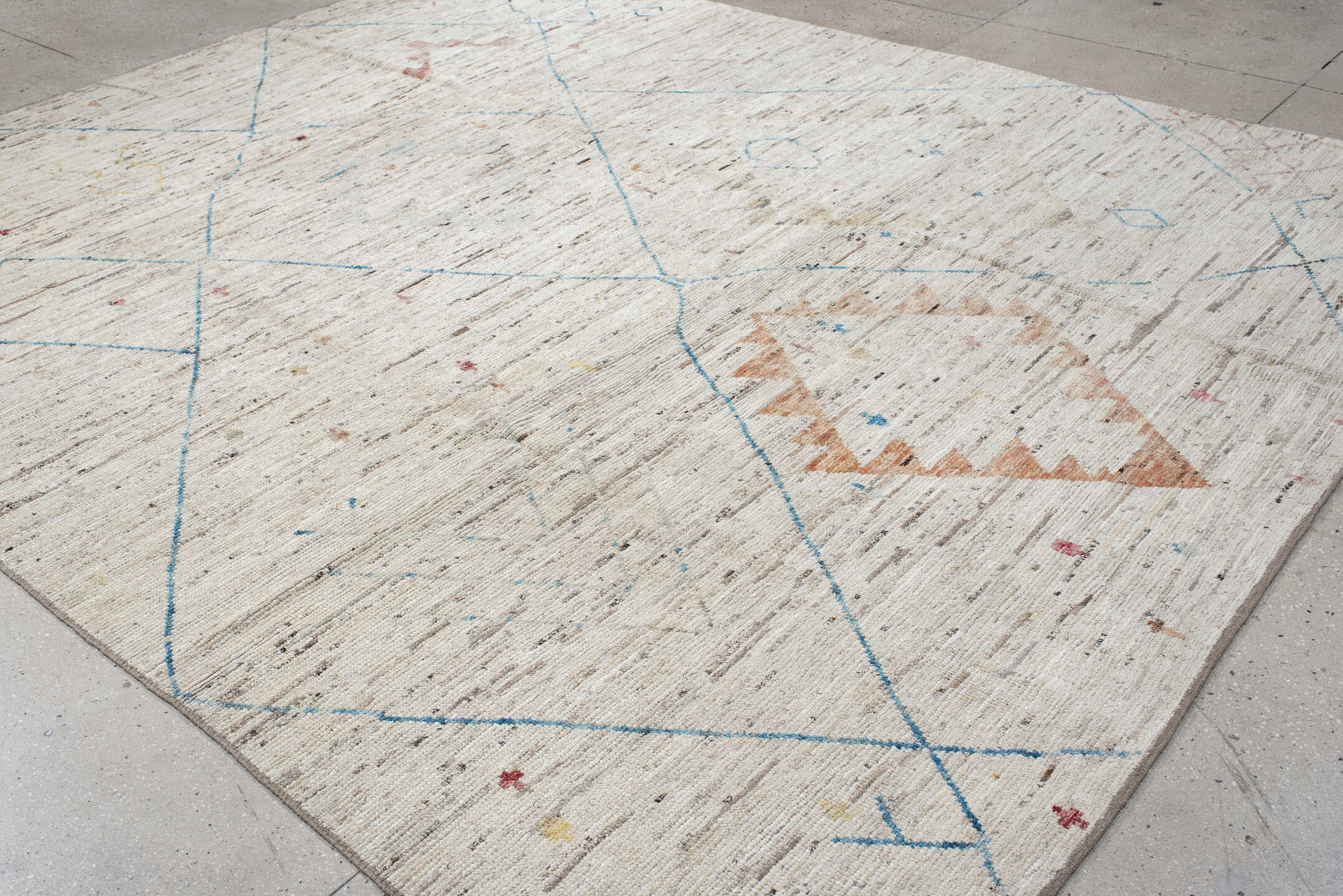 11' x 9' one-of-a-kind handmade vintage Tulu rug. Color palette: ivory, sky_blue, taupe, peach, blush, muted_gold, brown