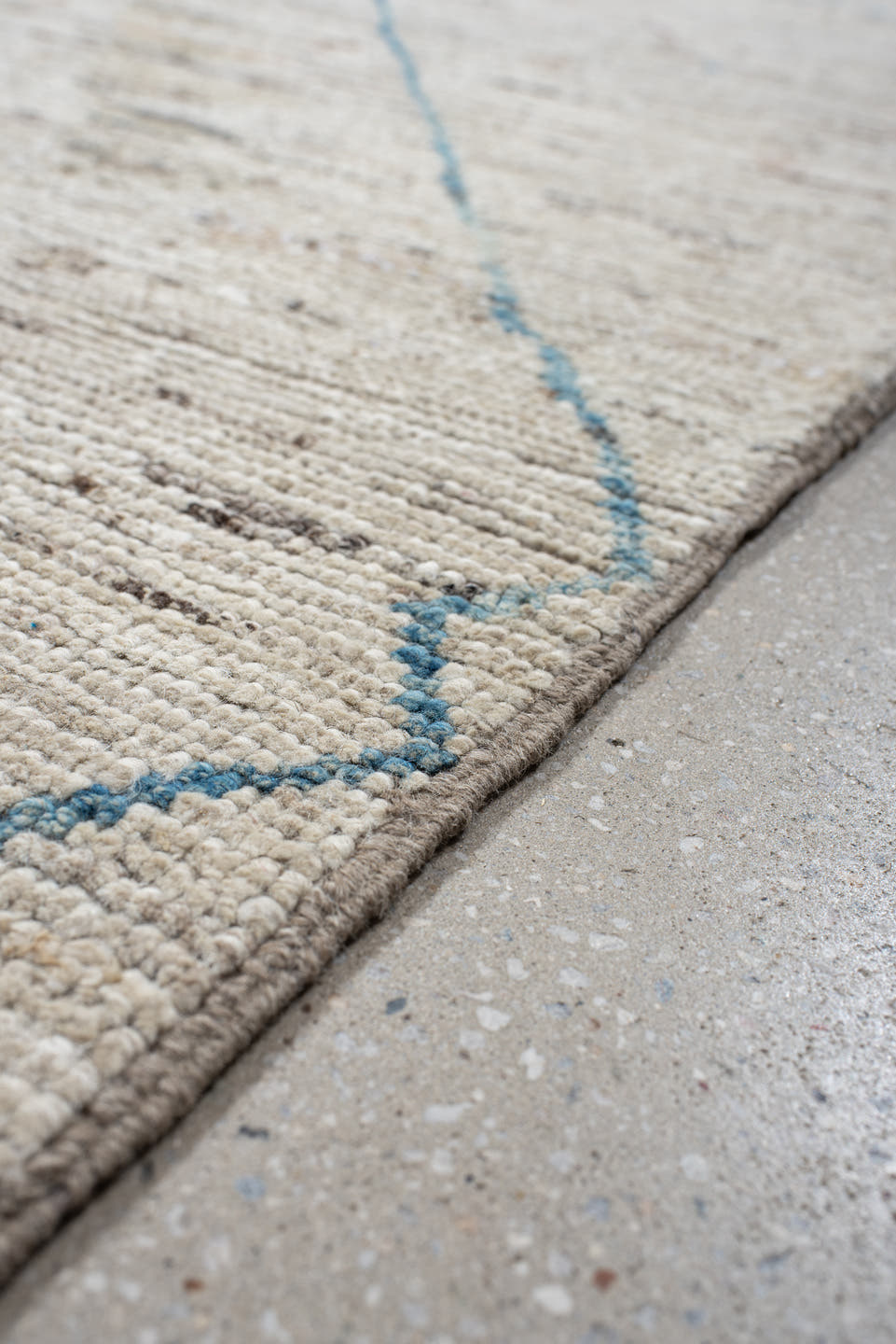 11' x 9' one-of-a-kind handmade vintage Tulu rug. Color palette: ivory, sky_blue, taupe, peach, blush, muted_gold, brown