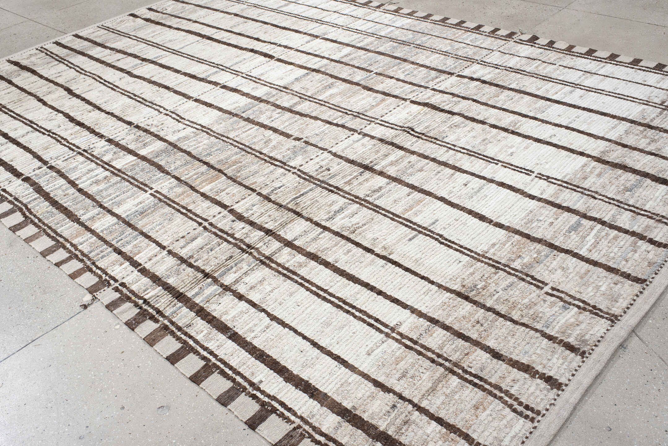 8' x 12' one-of-a-kind handmade vintage Tulu large size rug. Color palette: ivory, brown, taupe, gray, beige