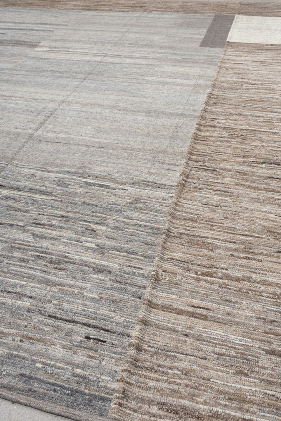 12' x 15' one-of-a-kind handmade vintage Tulu oversize rug. Color palette: gray, taupe, camel, ivory, greige, charcoal