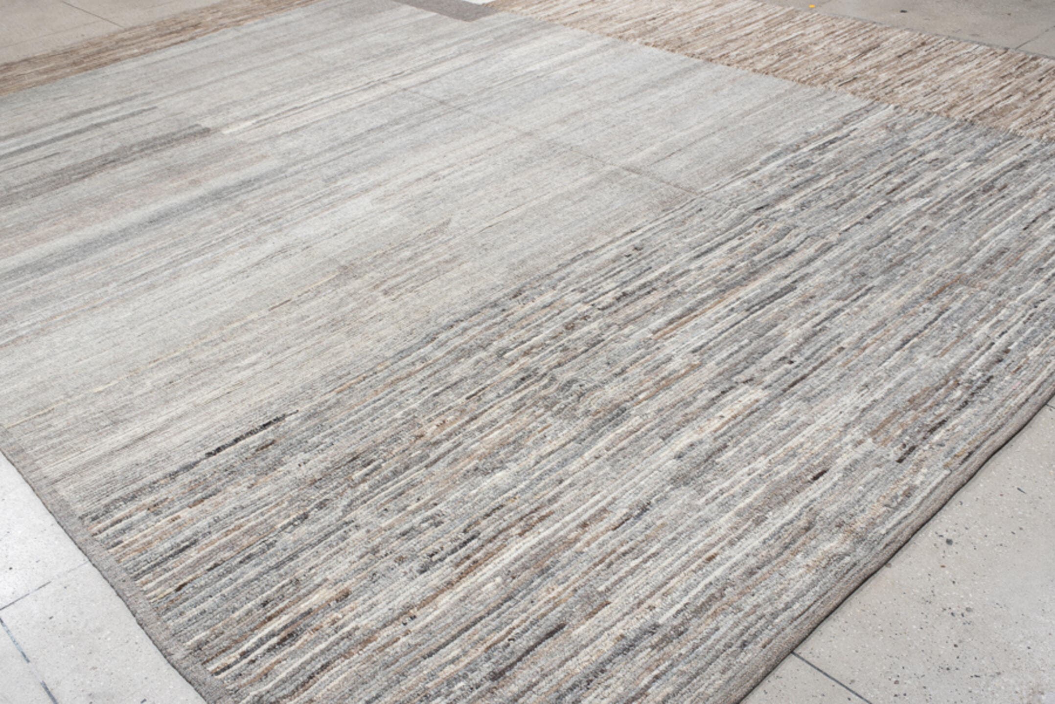 12' x 15' one-of-a-kind handmade vintage Tulu oversize rug. Color palette: gray, taupe, camel, ivory, greige, charcoal