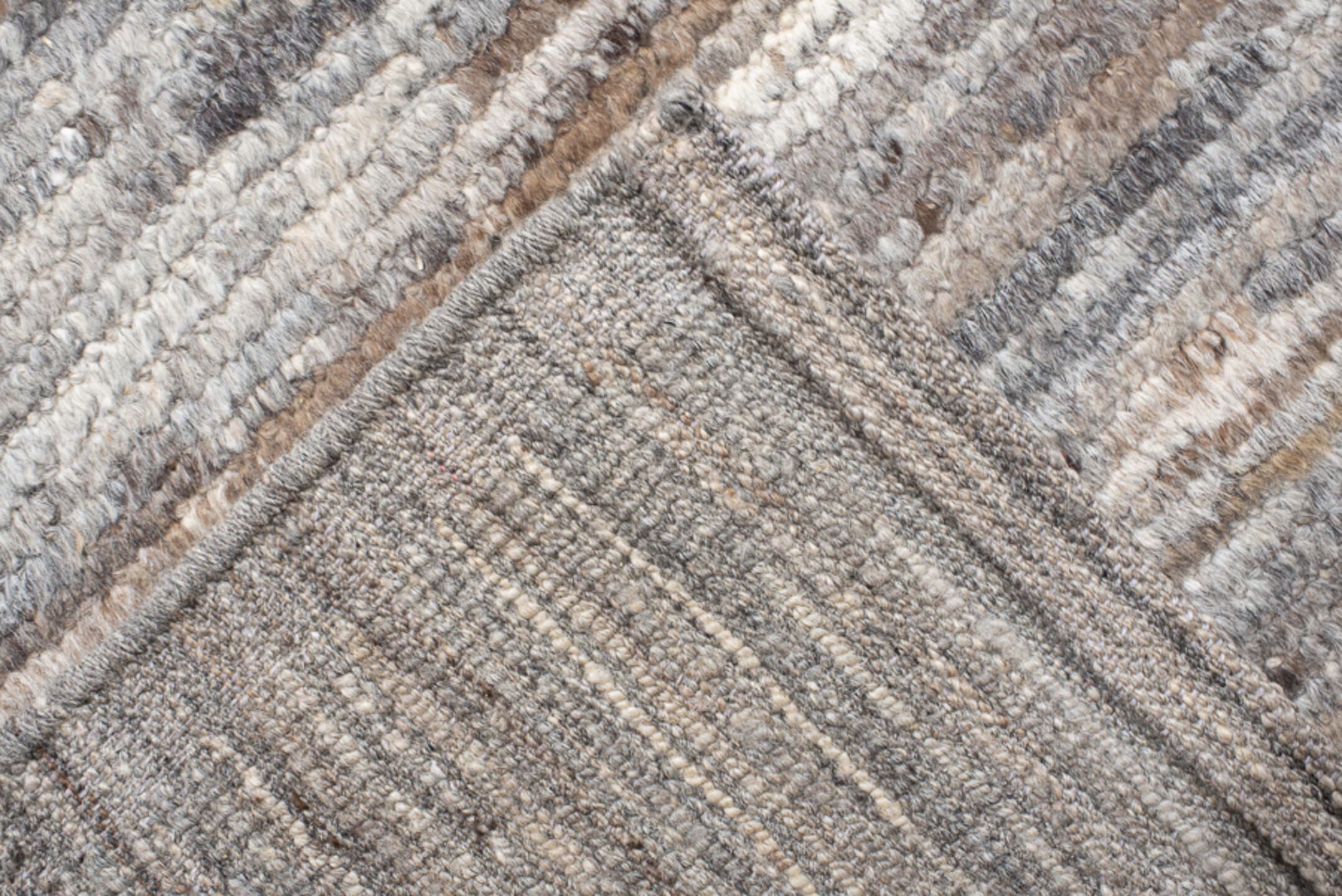 12' x 15' one-of-a-kind handmade vintage Tulu oversize rug. Color palette: gray, taupe, camel, ivory, greige, charcoal