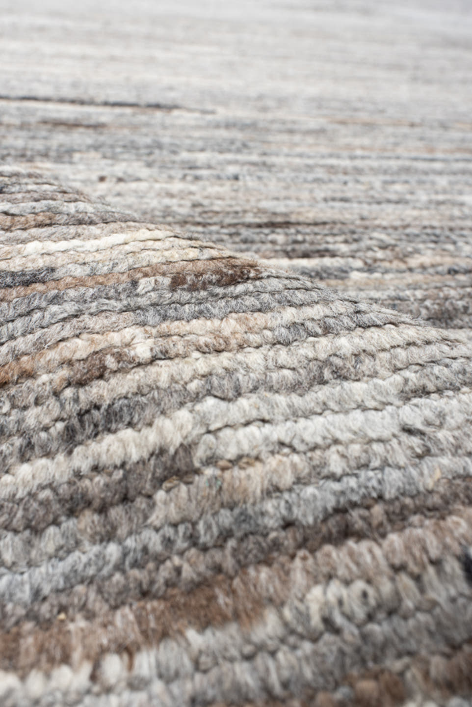 12' x 15' one-of-a-kind handmade vintage Tulu oversize rug. Color palette: gray, taupe, camel, ivory, greige, charcoal