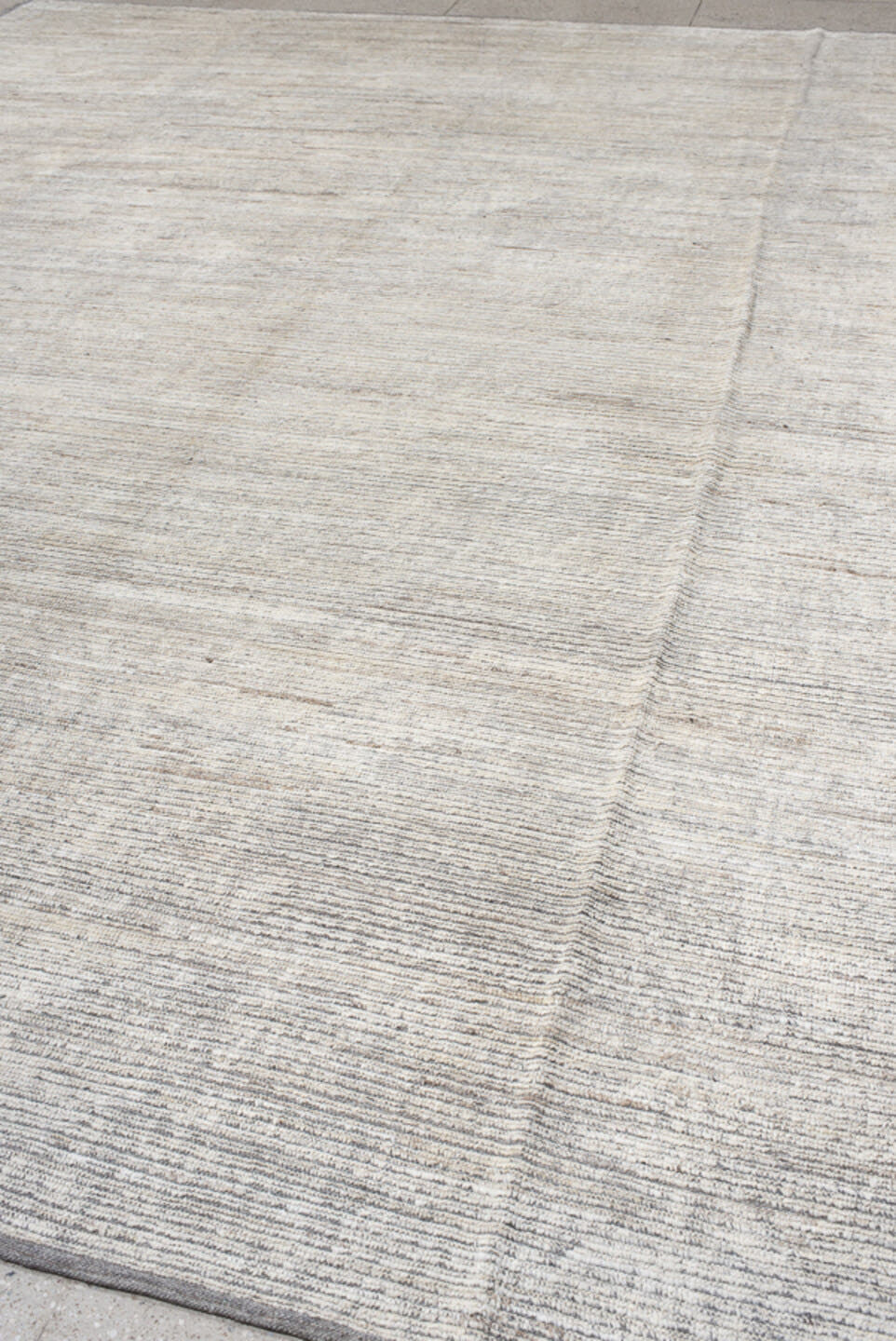 12' x 15' one-of-a-kind handmade vintage Tulu oversize rug. Color palette: ivory, gray, taupe, charcoal, cream, beige, black