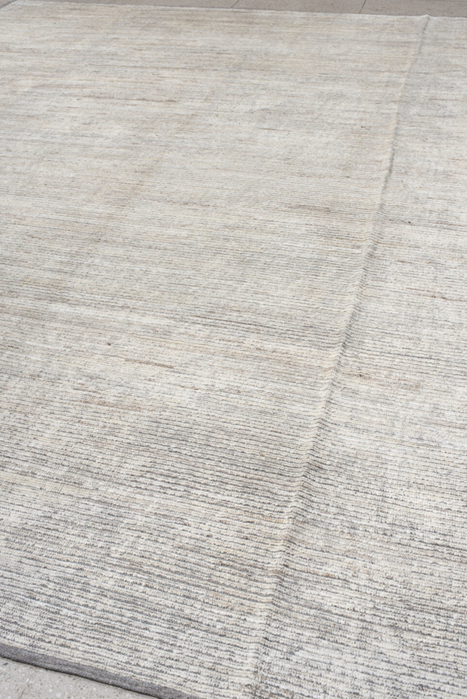 12' x 15' one-of-a-kind handmade vintage Tulu oversize rug. Color palette: ivory, gray, taupe, charcoal, cream, beige, black