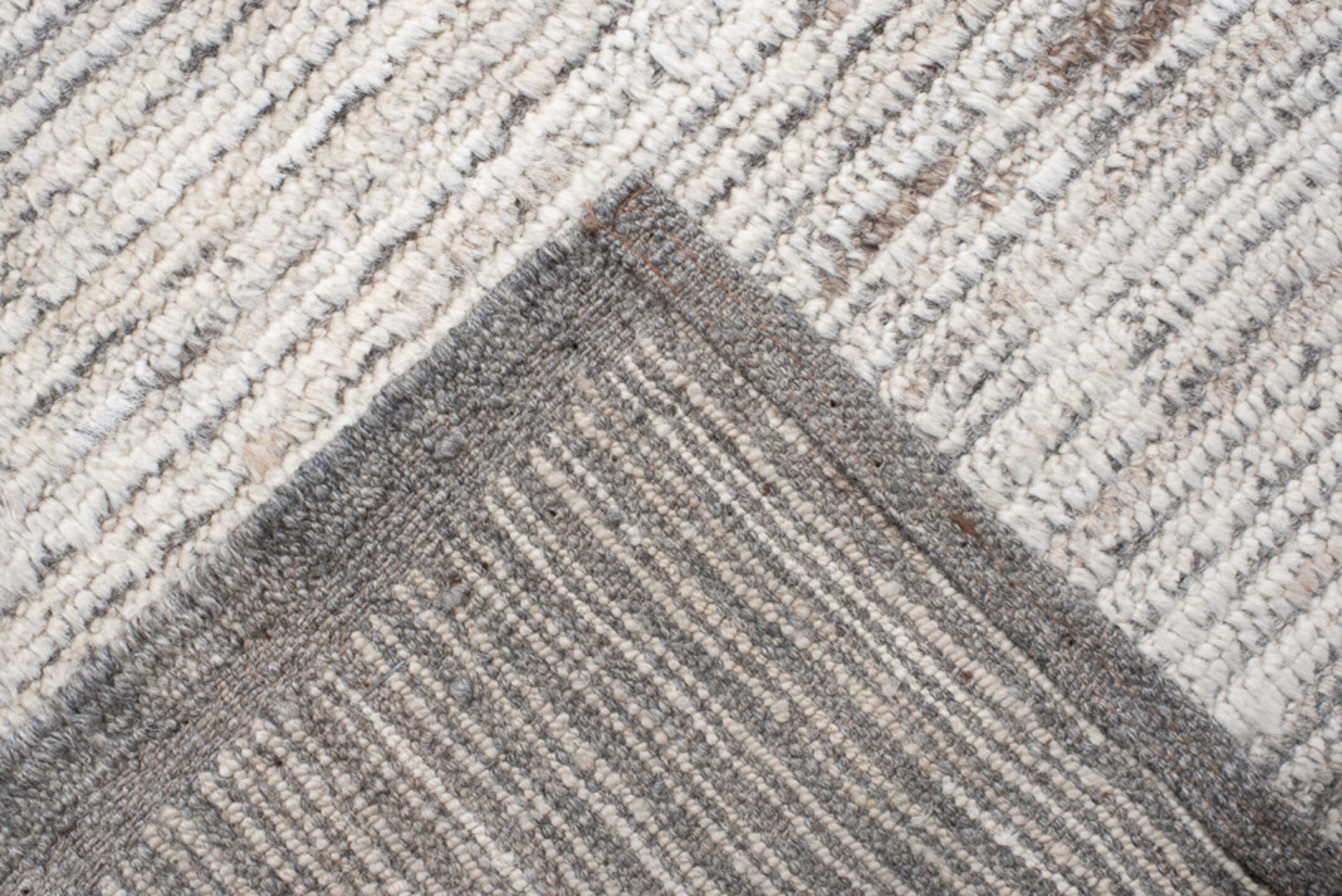 12' x 15' one-of-a-kind handmade vintage Tulu oversize rug. Color palette: ivory, gray, taupe, charcoal, cream, beige, black