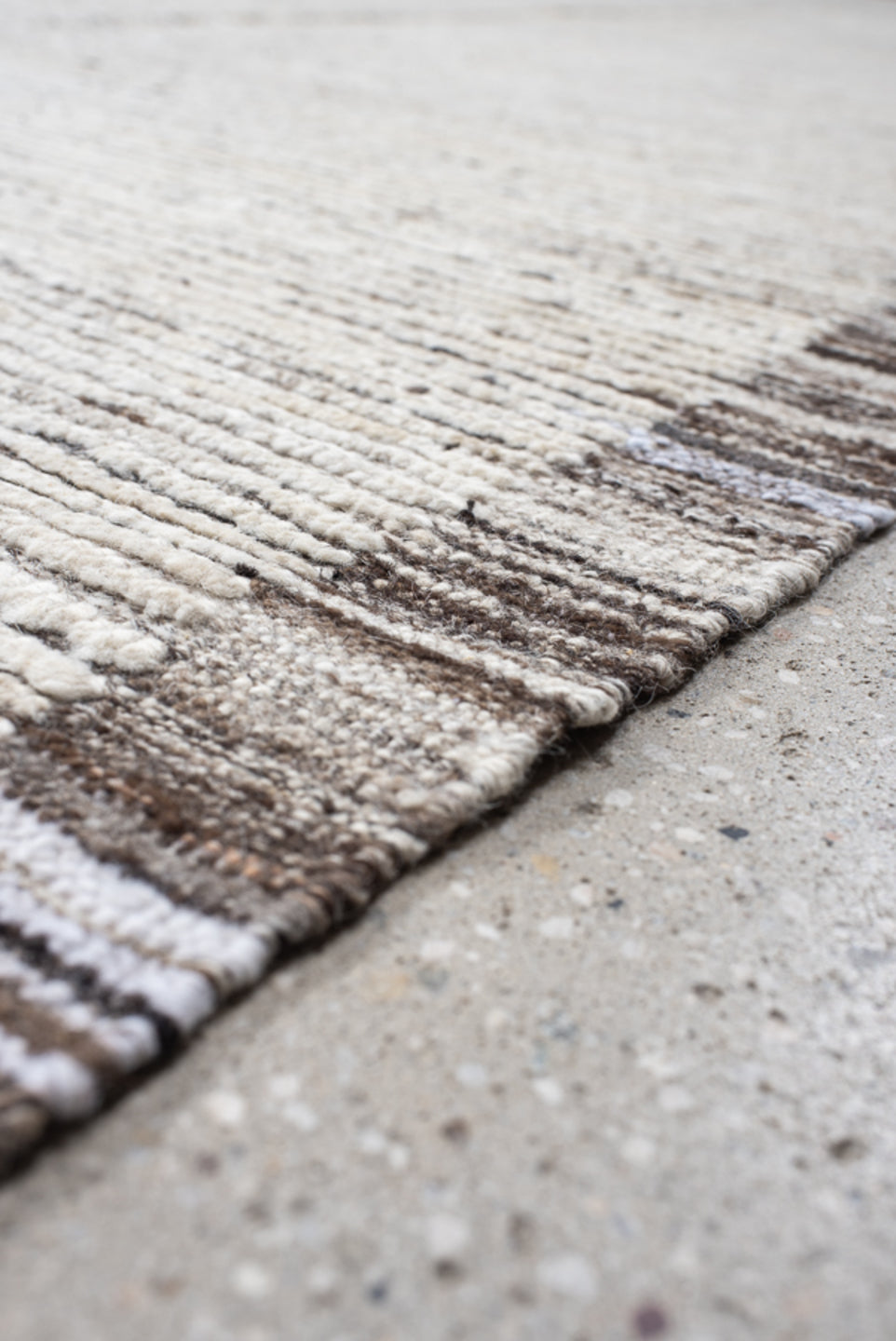 12' x 14' one-of-a-kind handmade vintage Tulu oversize rug. Color palette: ivory, charcoal, taupe, cream, gray, black, beige