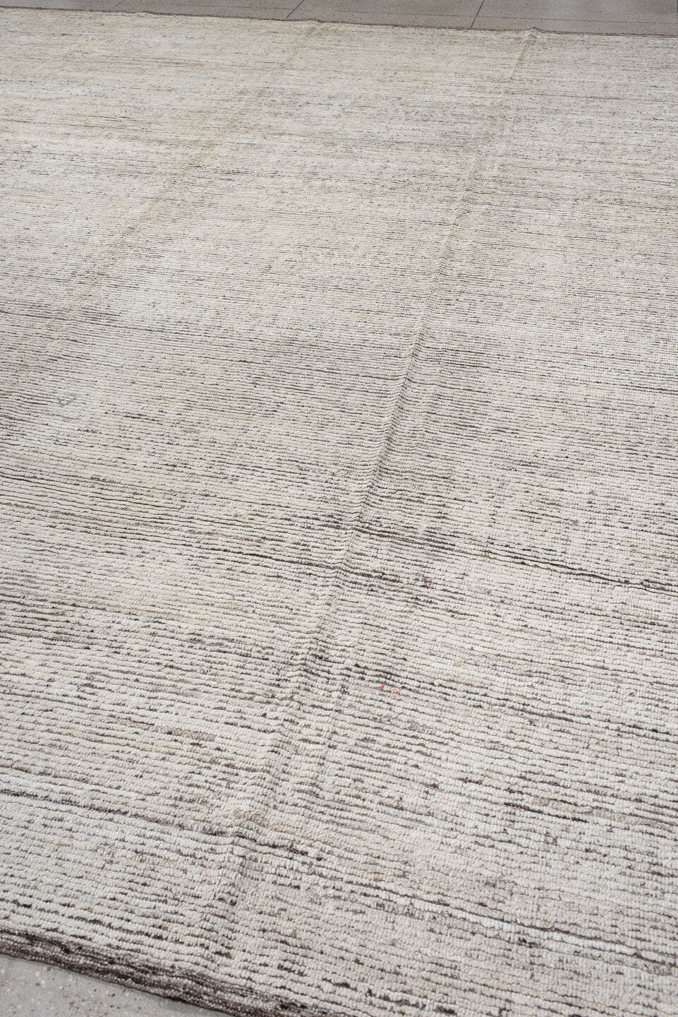 12' x 14' one-of-a-kind handmade vintage Tulu oversize rug. Color palette: ivory, taupe, brown, charcoal, beige, gray, black