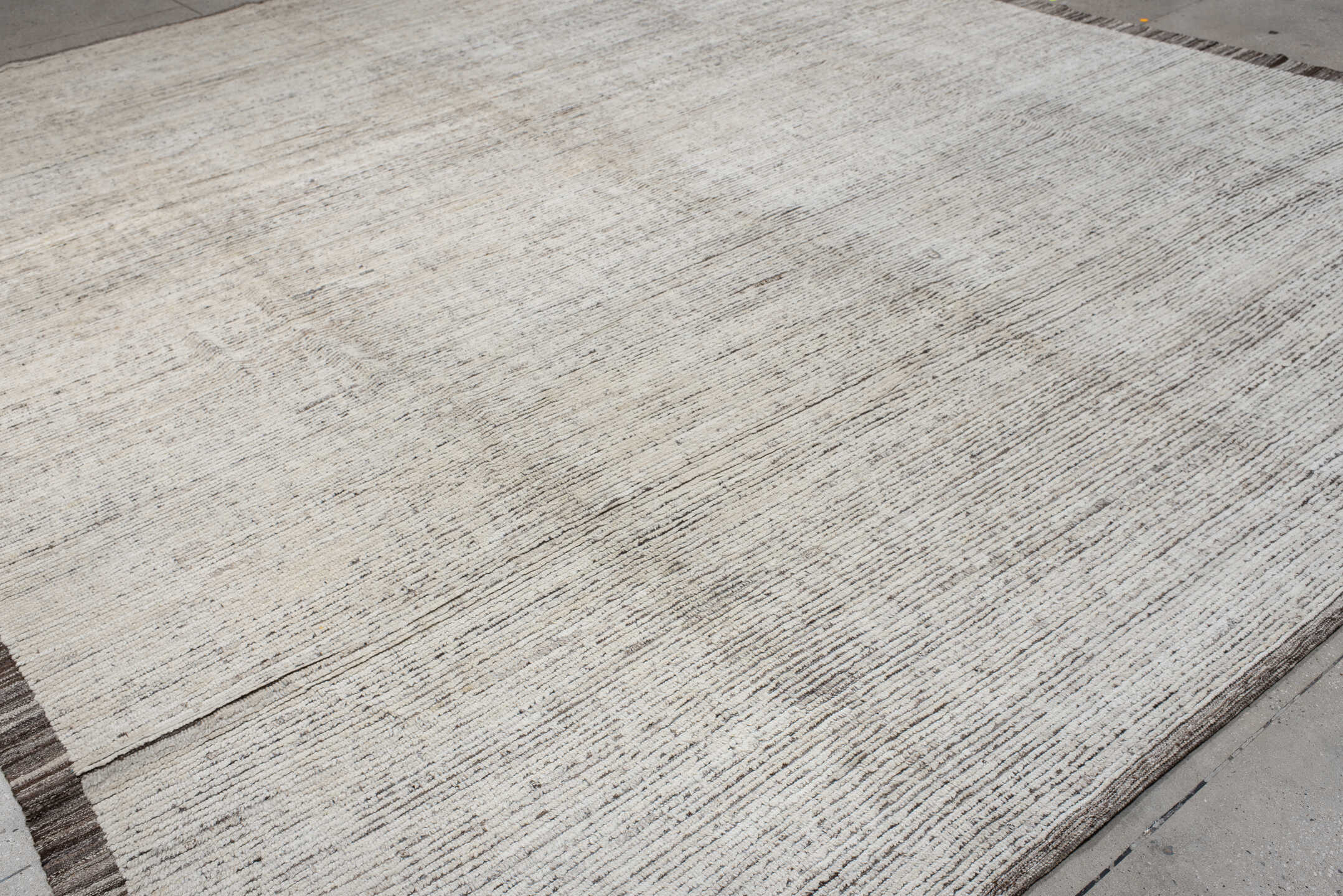 12' x 14' one-of-a-kind handmade vintage Tulu oversize rug. Color palette: ivory, taupe, brown, charcoal, beige, gray, black