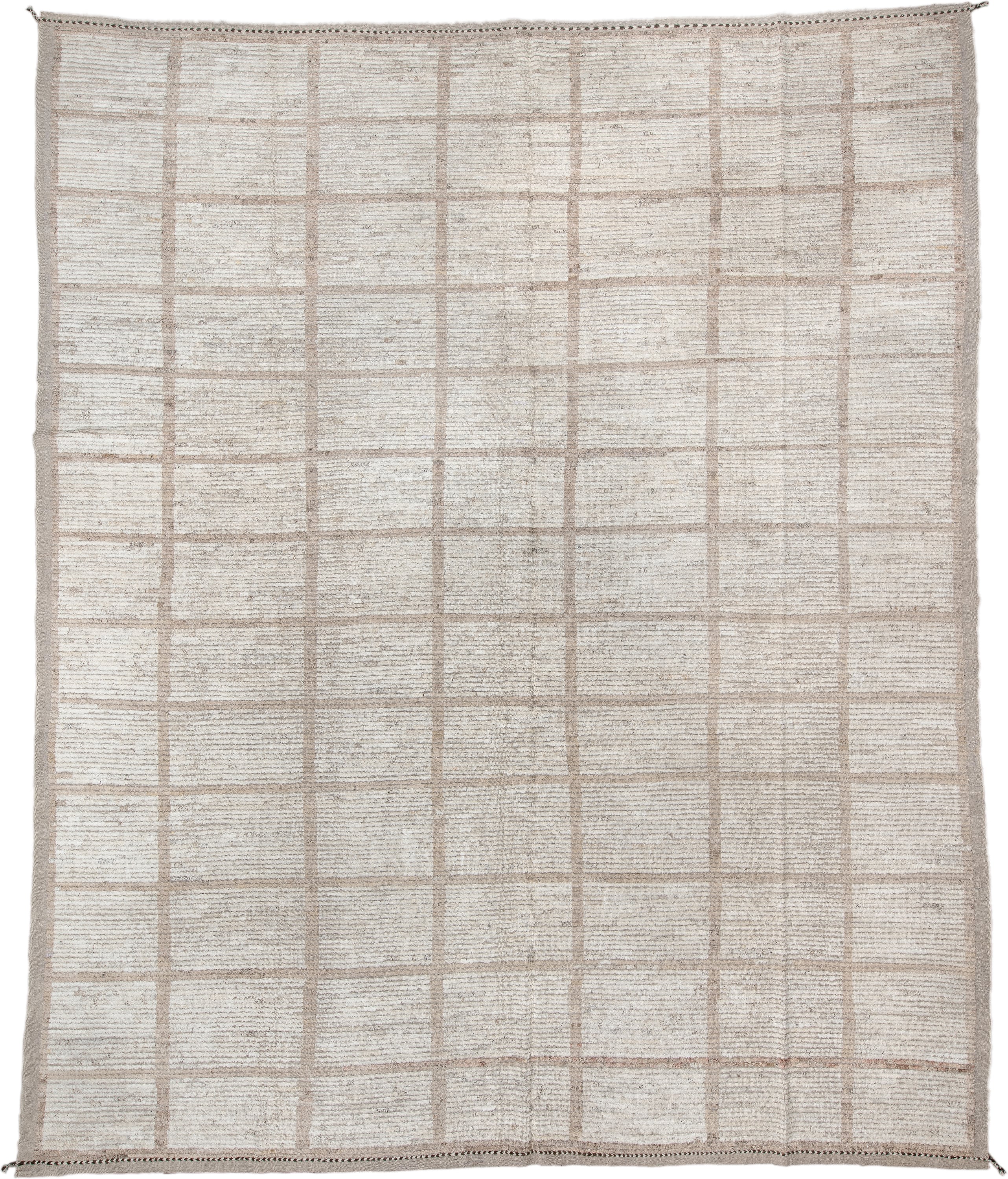 12' x 15' one-of-a-kind handmade vintage Tulu oversize rug. Color palette: ivory, taupe, cream, beige, camel, gray