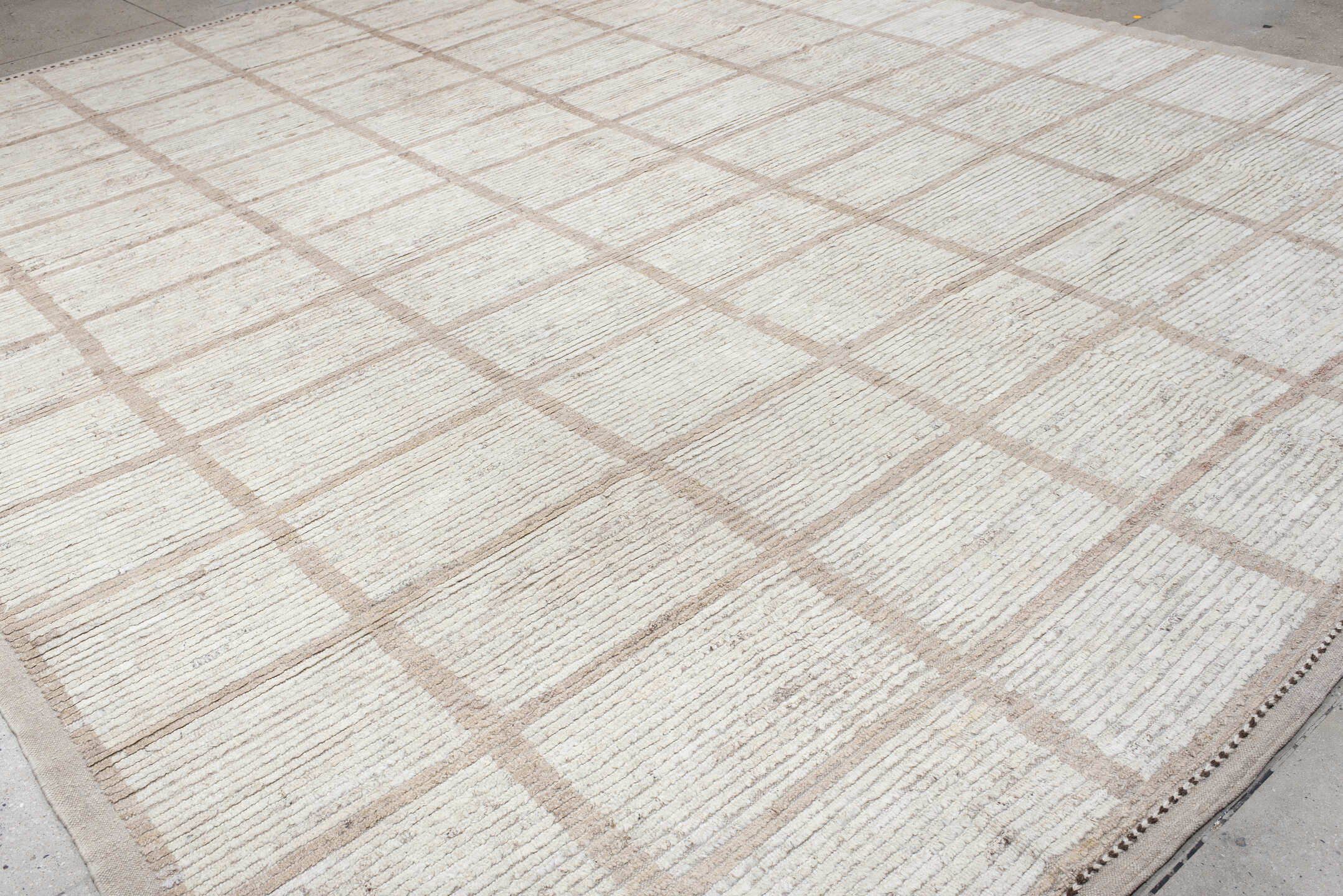 12' x 15' one-of-a-kind handmade vintage Tulu oversize rug. Color palette: ivory, taupe, cream, beige, camel, gray