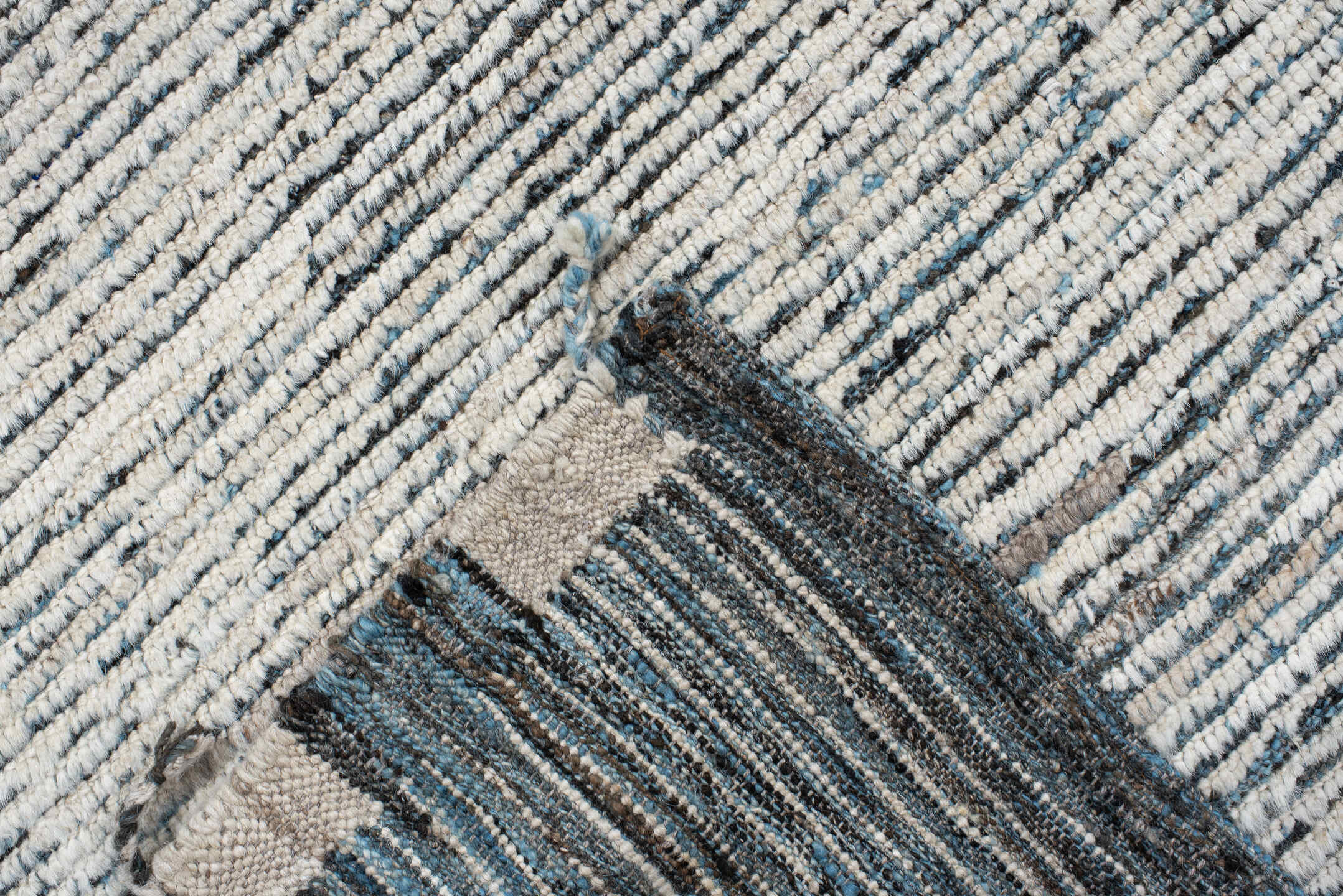 12' x 14' one-of-a-kind handmade vintage Tulu oversize rug. Color palette: ivory, slate, charcoal, taupe, gray, black, beige