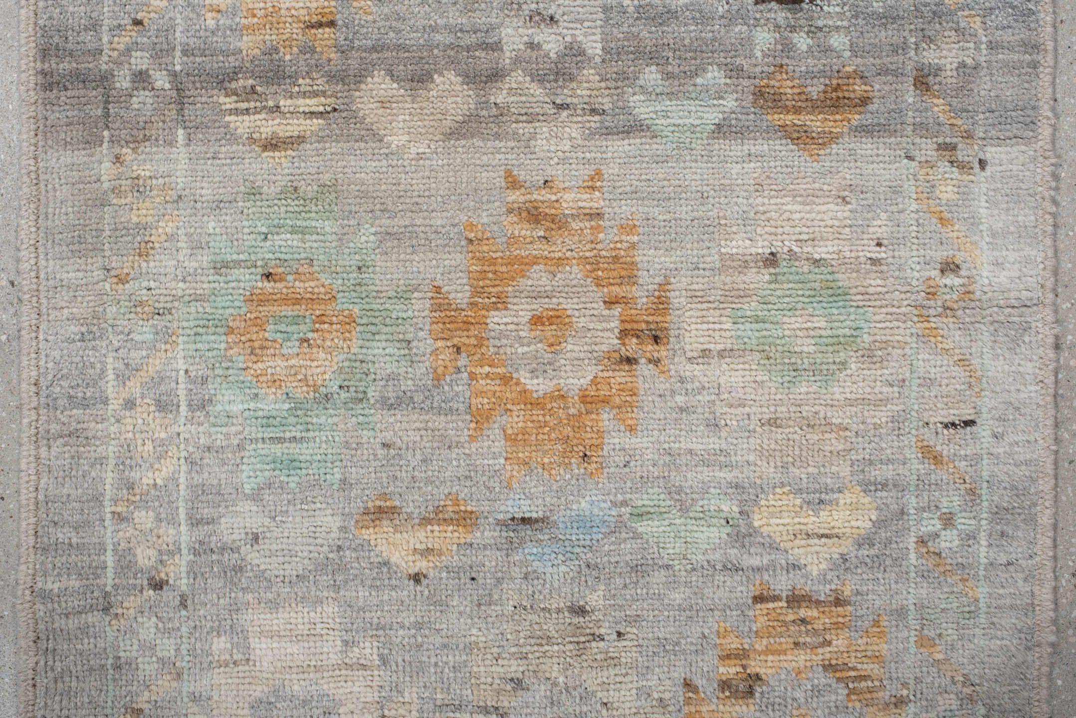 2' x 10' one-of-a-kind handmade vintage Tulu runner rug. Color palette: gray, ivory, aqua, apricot, taupe, charcoal, sand