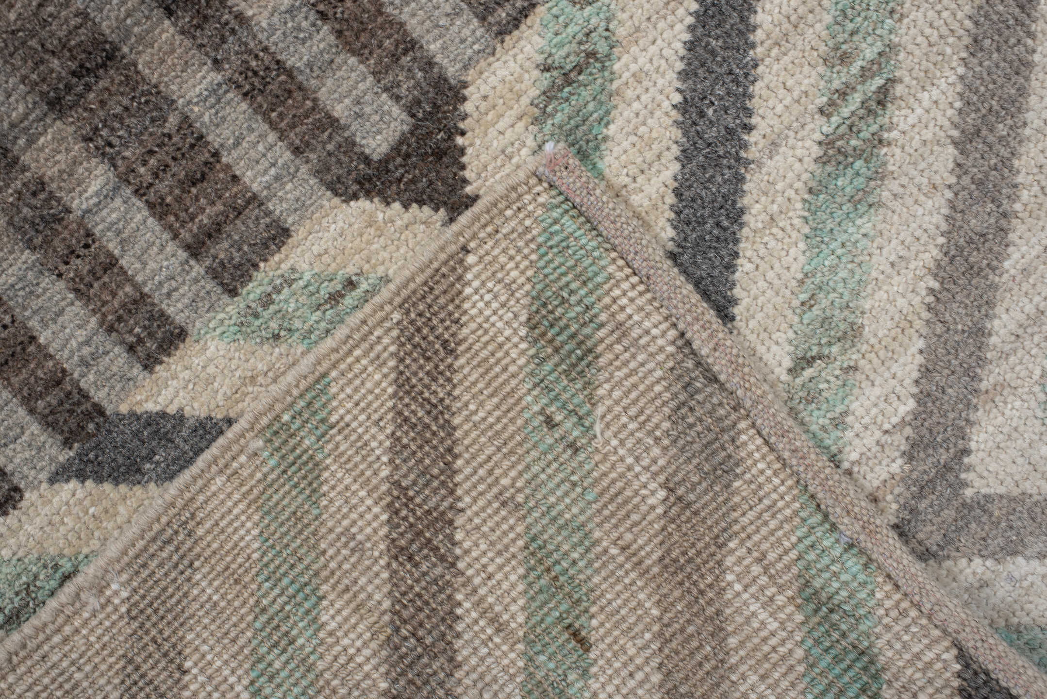 2' x 9' one-of-a-kind handmade vintage Tulu runner rug. Color palette: ivory, taupe, charcoal, sage, gray, cream, beige
