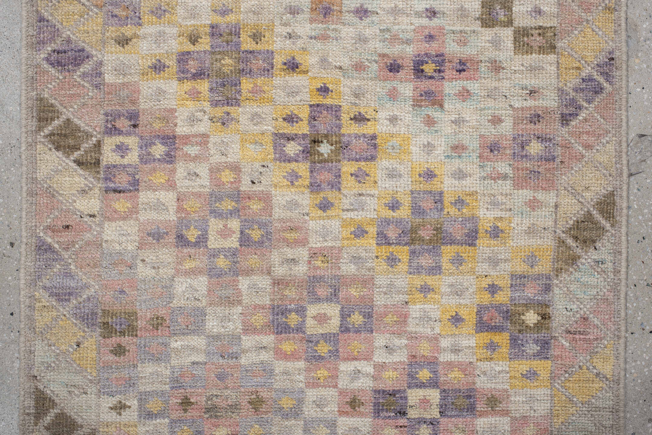 2' x 12' one-of-a-kind handmade vintage Tulu runner rug. Color palette: ivory, taupe, lavender, gold, terra cotta, sage