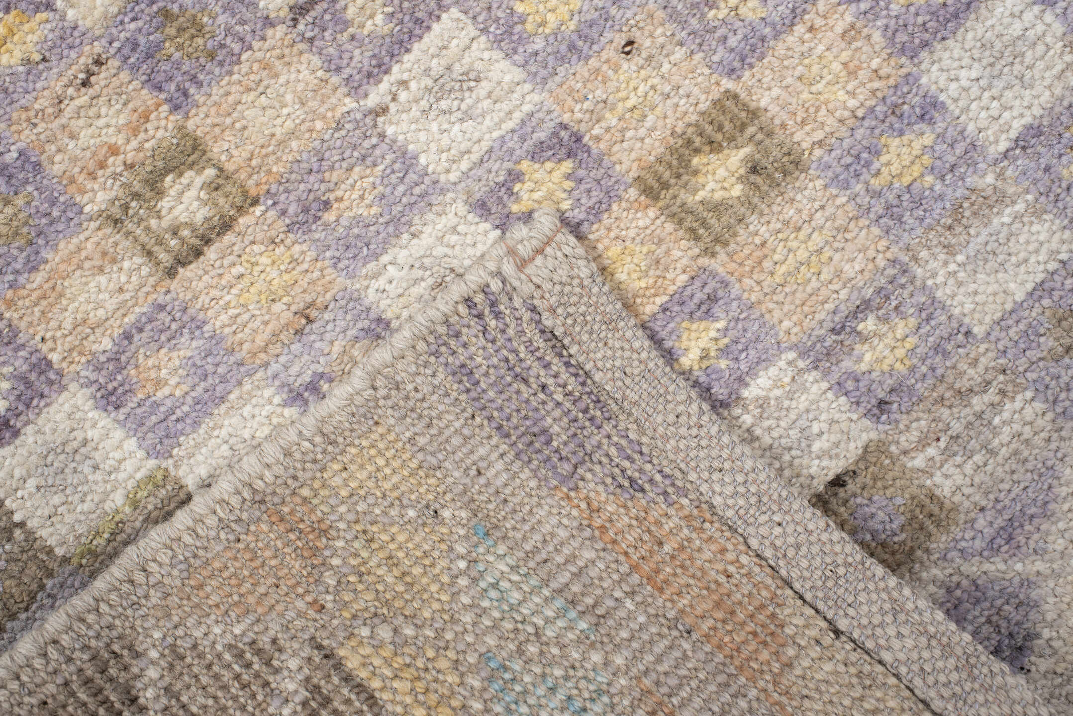 2' x 12' one-of-a-kind handmade vintage Tulu runner rug. Color palette: ivory, taupe, lavender, gold, terra cotta, sage