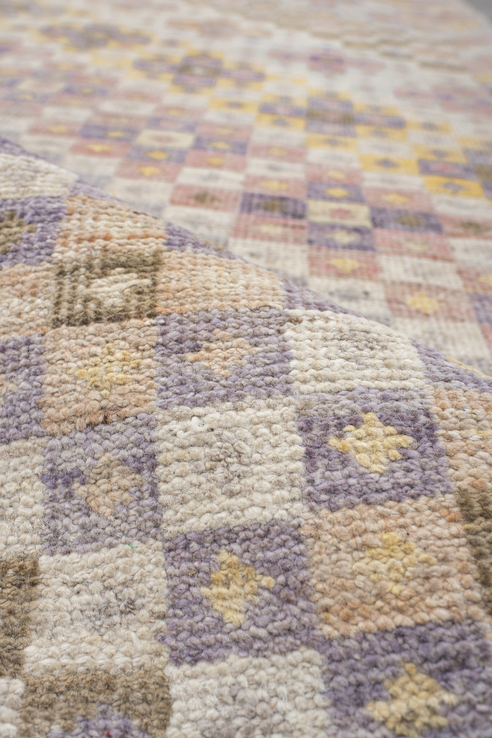 2' x 12' one-of-a-kind handmade vintage Tulu runner rug. Color palette: ivory, taupe, lavender, gold, terra cotta, sage