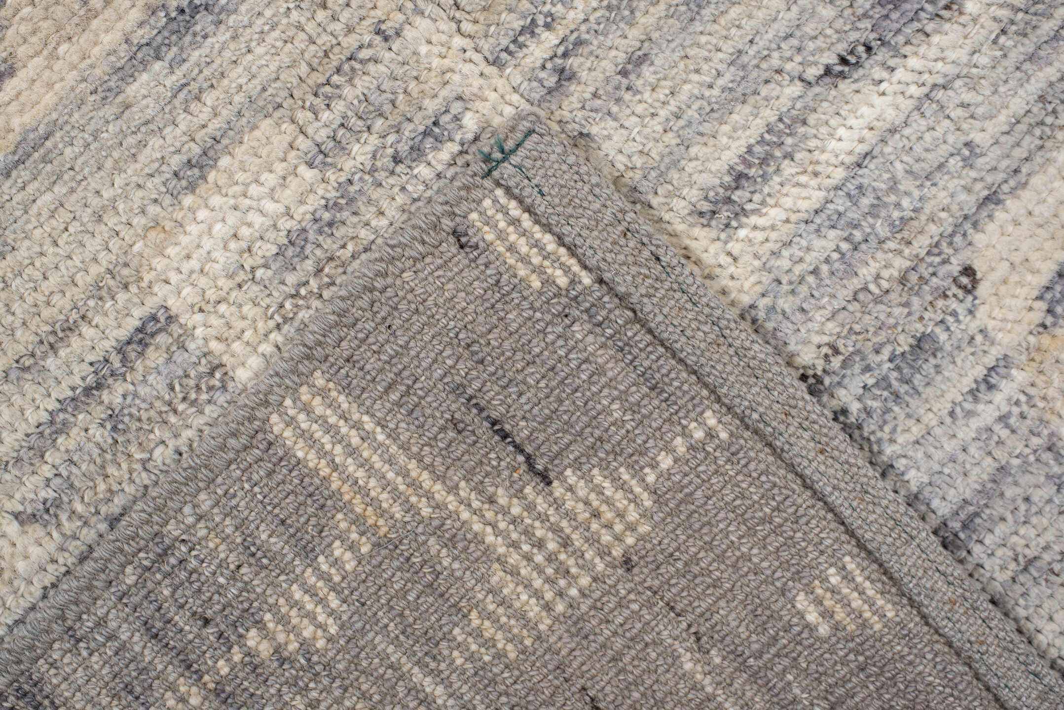 4' x 9' one-of-a-kind handmade vintage Tulu runner rug. Color palette: ivory, gray, slate, cream
