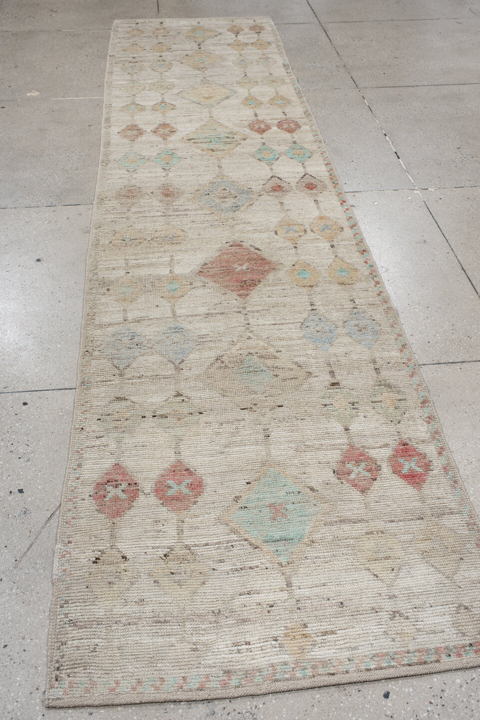 3' x 12' one-of-a-kind handmade vintage Tulu runner rug. Color palette: ivory, beige, aqua, blush, sand, taupe, coral, gray