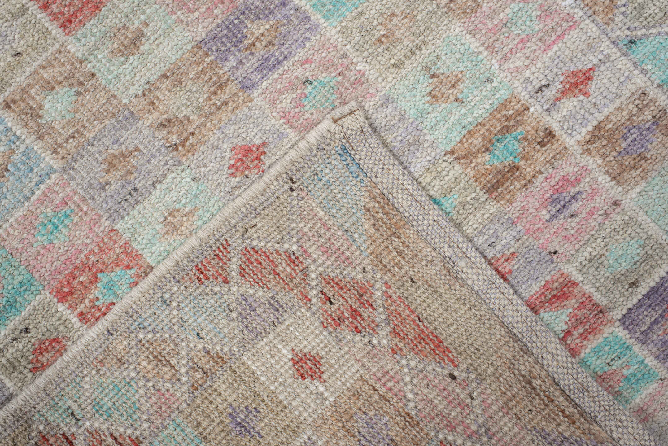 2' x 13' one-of-a-kind handmade vintage Tulu runner rug. Color palette: ivory, aqua, lavender, coral, taupe, sage, teal