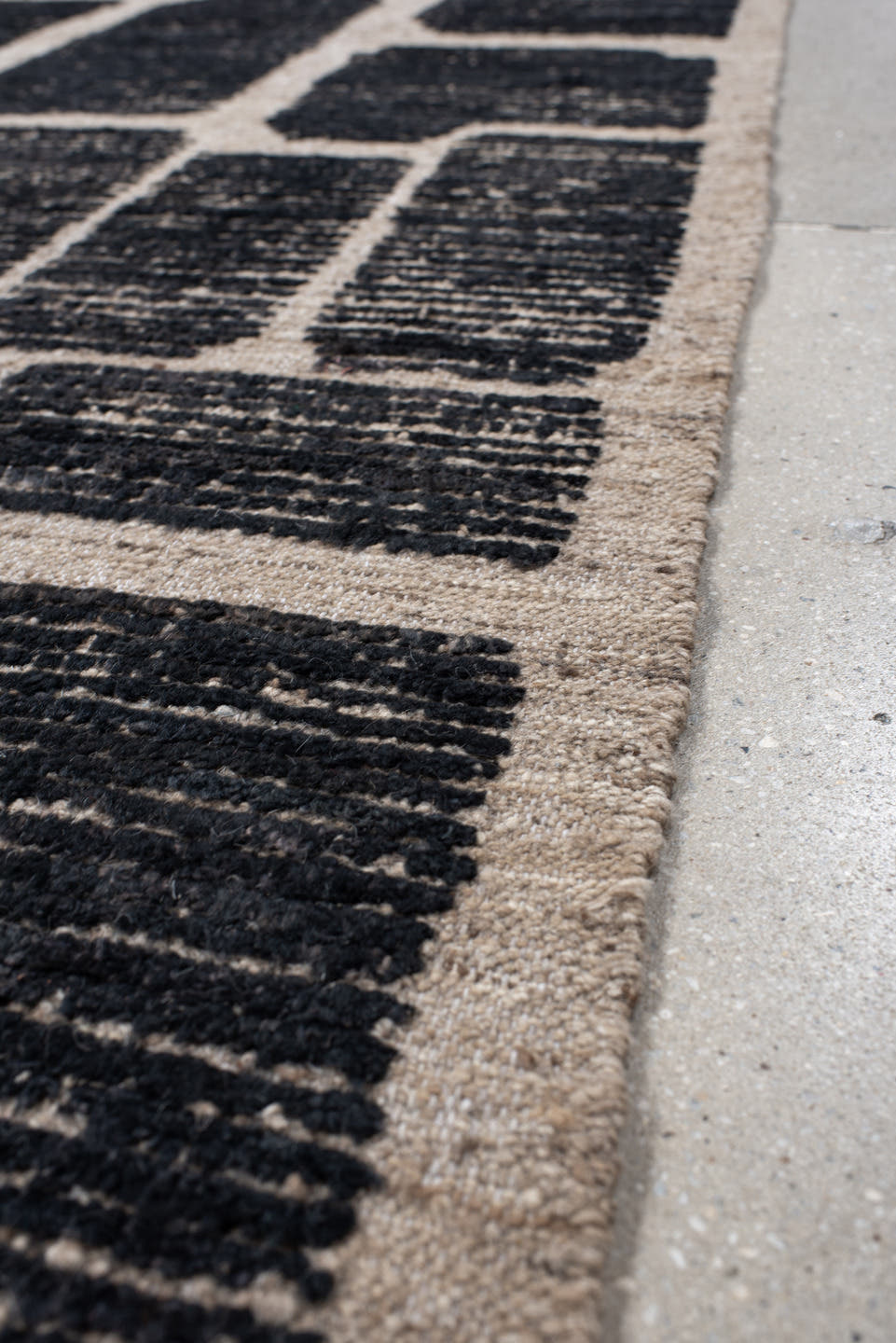 3' x 12' one-of-a-kind handmade vintage Tulu runner rug. Color palette: charcoal, taupe, ivory, gray, black, beige