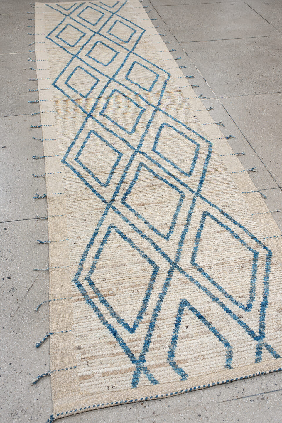 3' x 13' one-of-a-kind handmade vintage Tulu runner rug. Color palette: ivory, sky blue, cream, beige, light blue