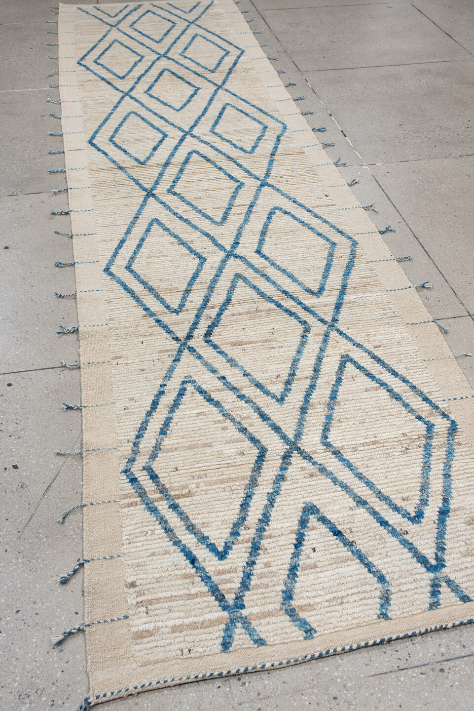 3' x 13' one-of-a-kind handmade vintage Tulu runner rug. Color palette: ivory, sky blue, cream, beige, light blue