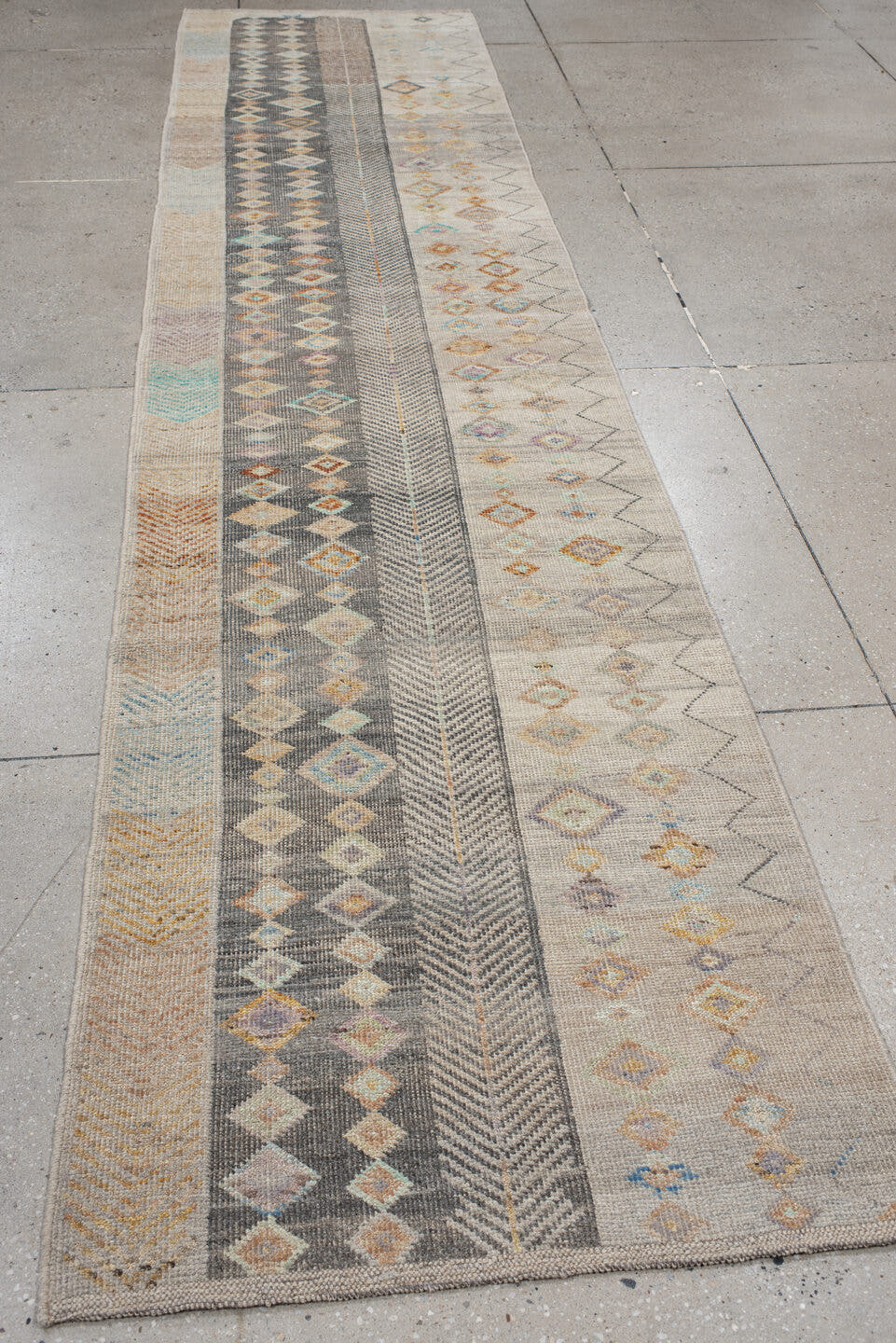 3' x 12' one-of-a-kind handmade vintage Tulu runner rug. Color palette: ivory, taupe, charcoal, camel, pale blue, saffron