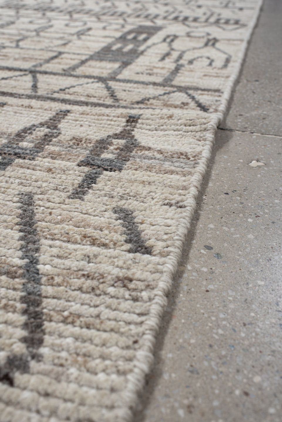 3' x 11' one-of-a-kind handmade vintage Tulu runner rug. Color palette: ivory, charcoal, taupe, cream, camel, gray, black