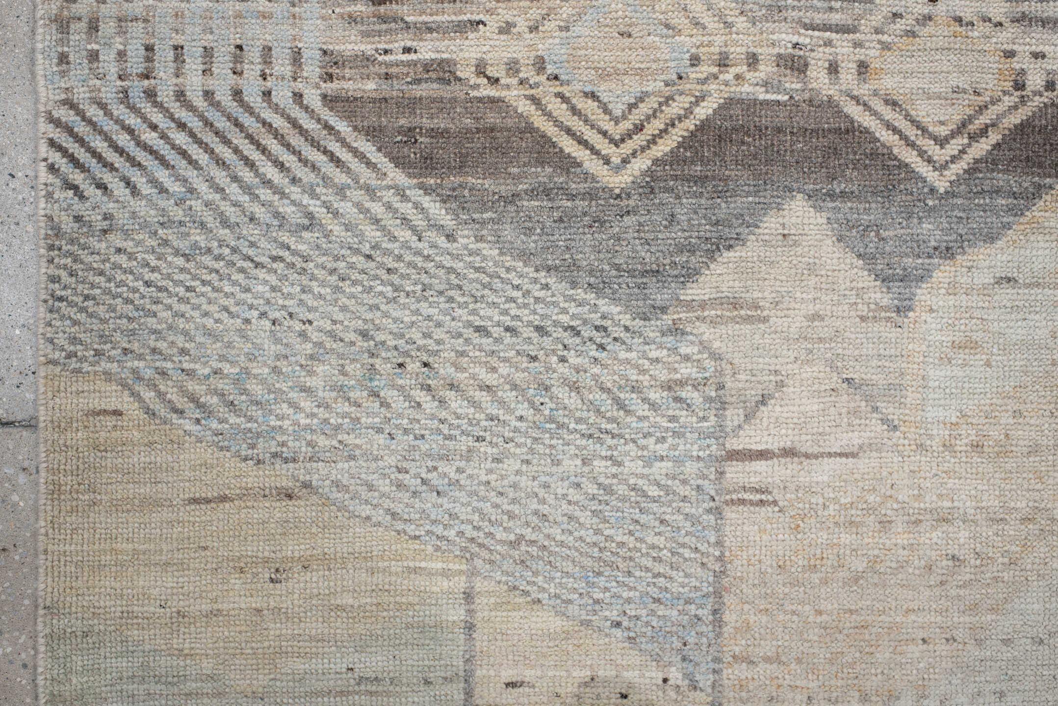 5' x 7' one-of-a-kind handmade vintage Tulu rug. Color palette: ivory, taupe, gray, pale blue, cream, charcoal, sand, beige