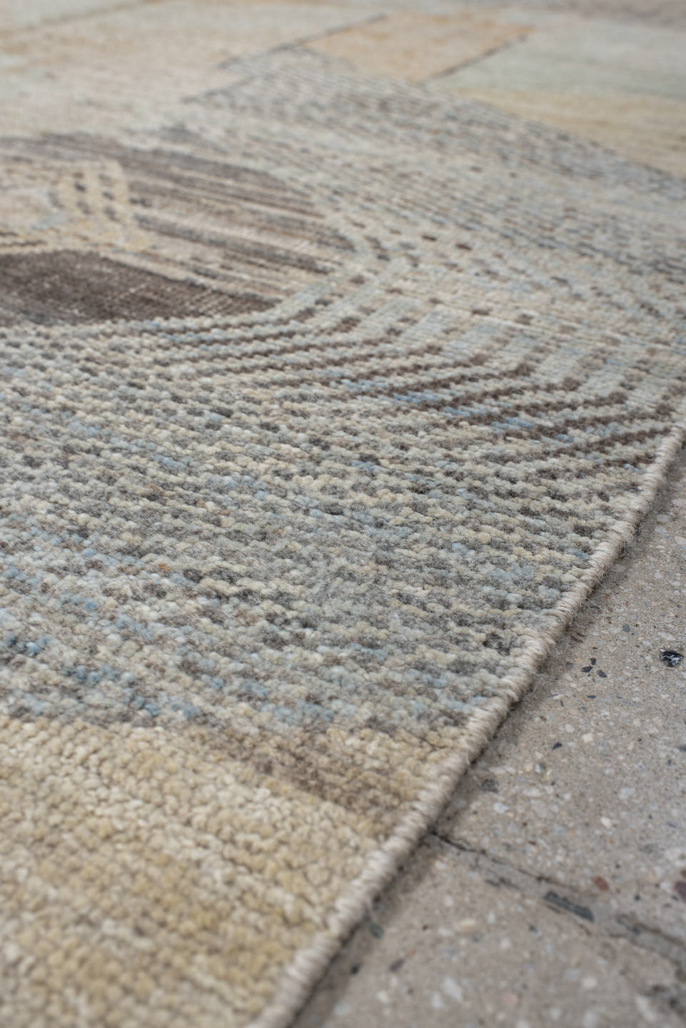5' x 7' one-of-a-kind handmade vintage Tulu rug. Color palette: ivory, taupe, gray, pale blue, cream, charcoal, sand, beige