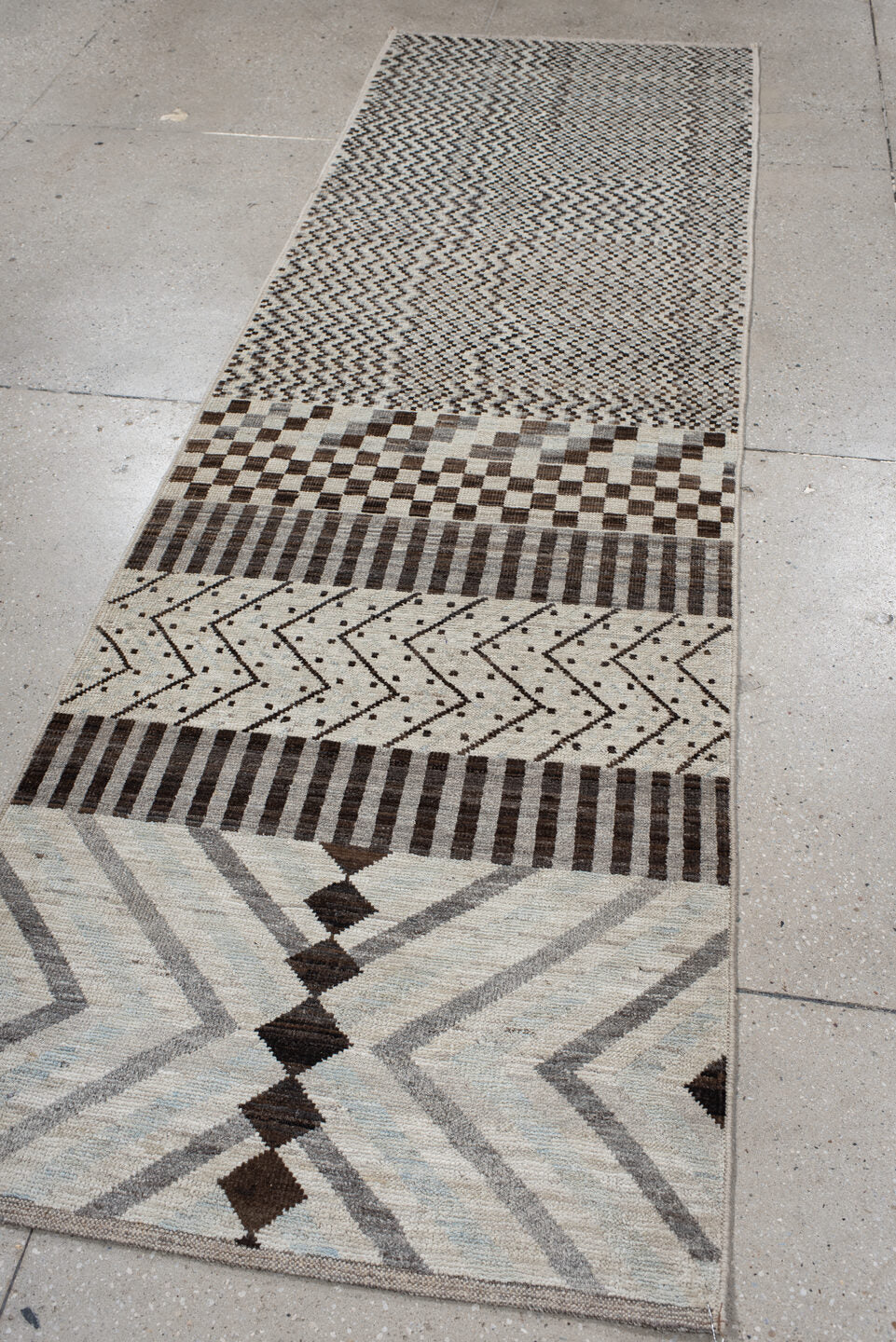 2' x 9' one-of-a-kind handmade vintage Tulu runner rug. Color palette: ivory, brown, gray, charcoal, taupe, black, beige