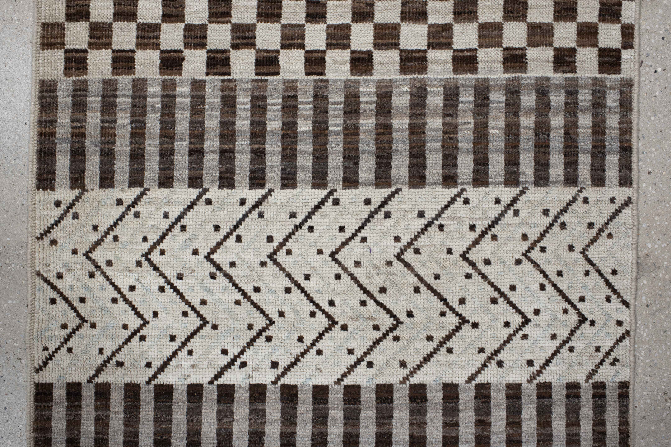 2' x 9' one-of-a-kind handmade vintage Tulu runner rug. Color palette: ivory, brown, gray, charcoal, taupe, black, beige