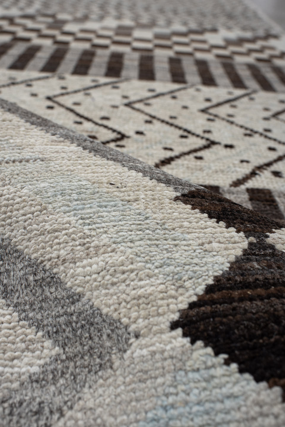 2' x 9' one-of-a-kind handmade vintage Tulu runner rug. Color palette: ivory, brown, gray, charcoal, taupe, black, beige
