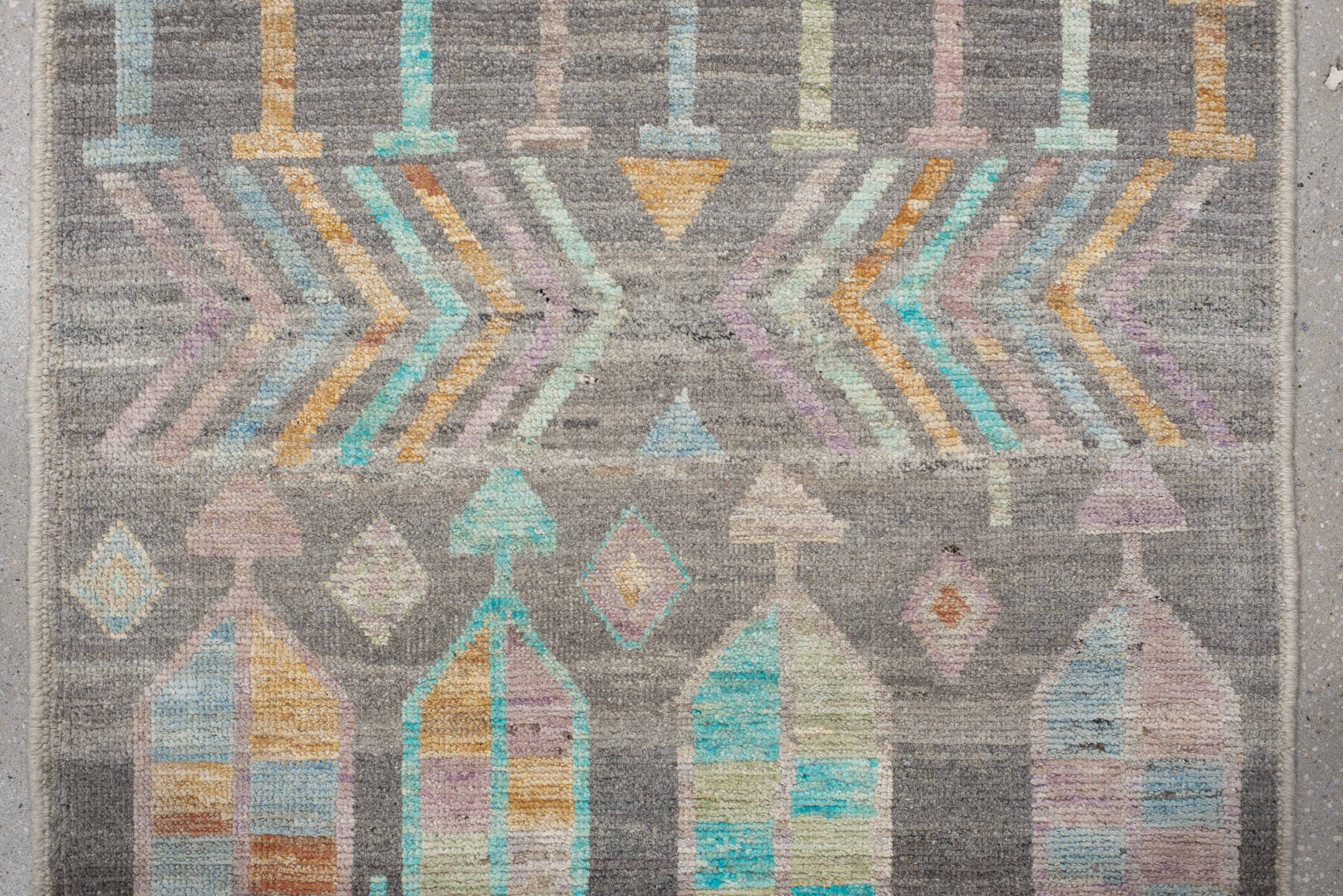 2' x 9' one-of-a-kind handmade vintage Tulu runner rug. Color palette: charcoal, aqua, ivory, lavender, peach, taupe, sage
